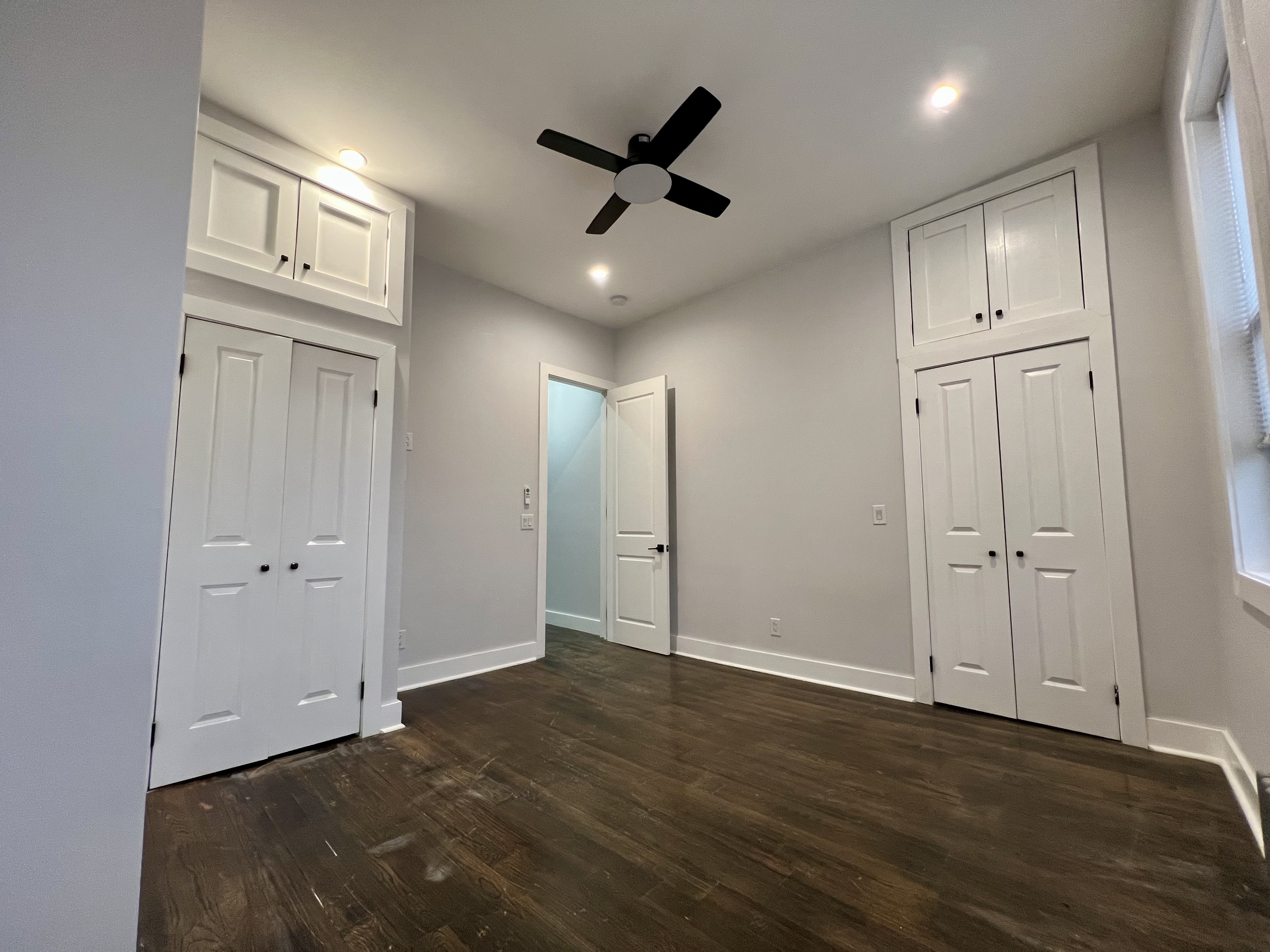 20 Suydam Street, Unit 1 Brooklyn, NY 11221 - Photo 3 of 10 a view of an empty room with a ceiling fan