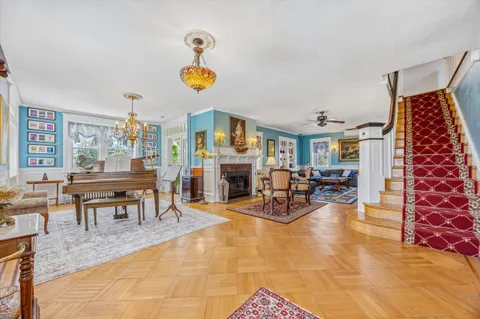 a view of a livingroom with furniture and a fireplace