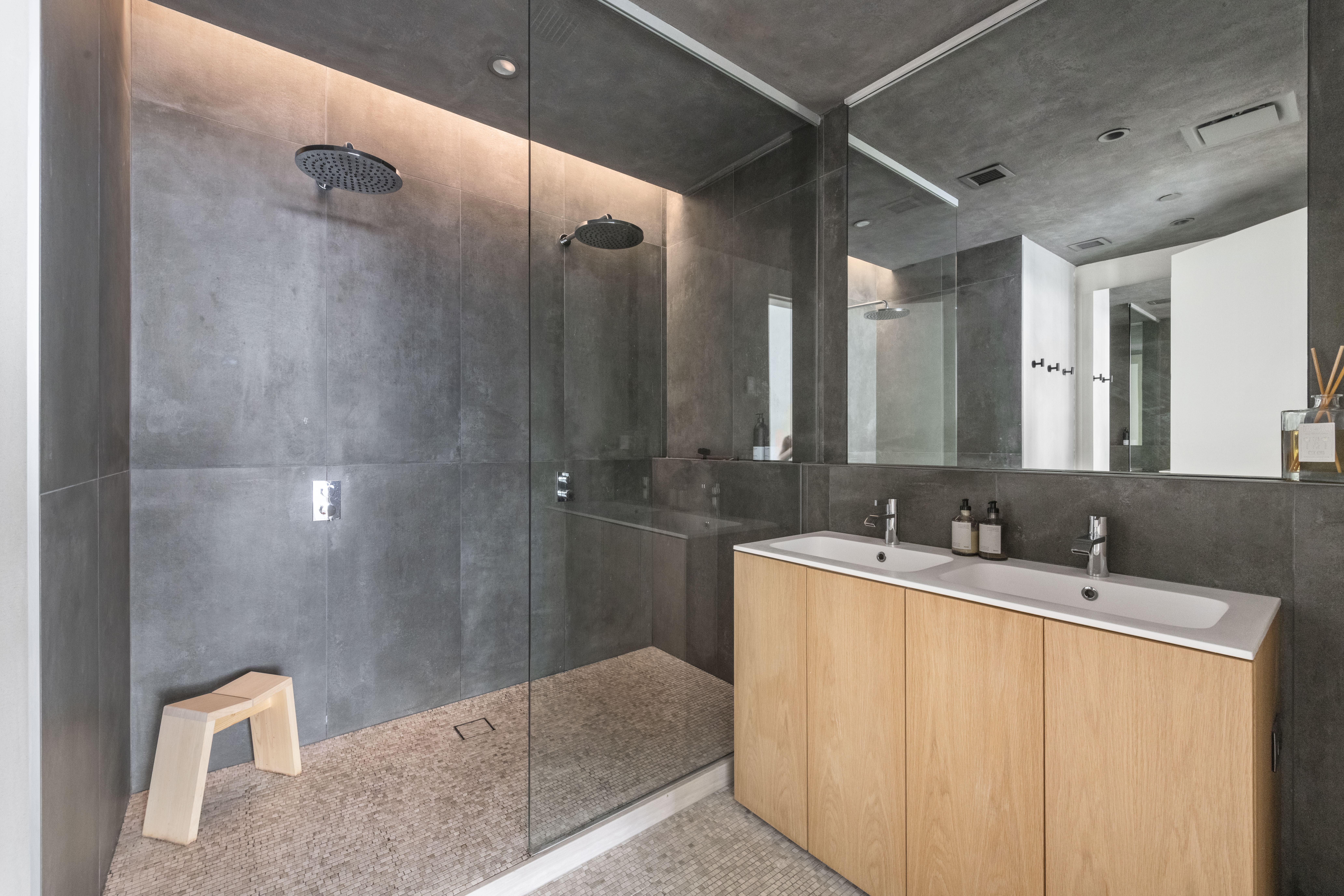 168 Plymouth Street, Unit 5A Brooklyn, NY 11201 - Photo 9 of 19 a bathroom with a double vanity sink and mirror