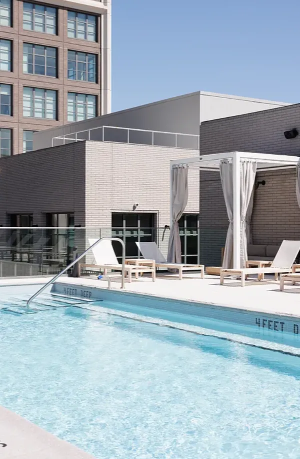 a view of pool table and chairs