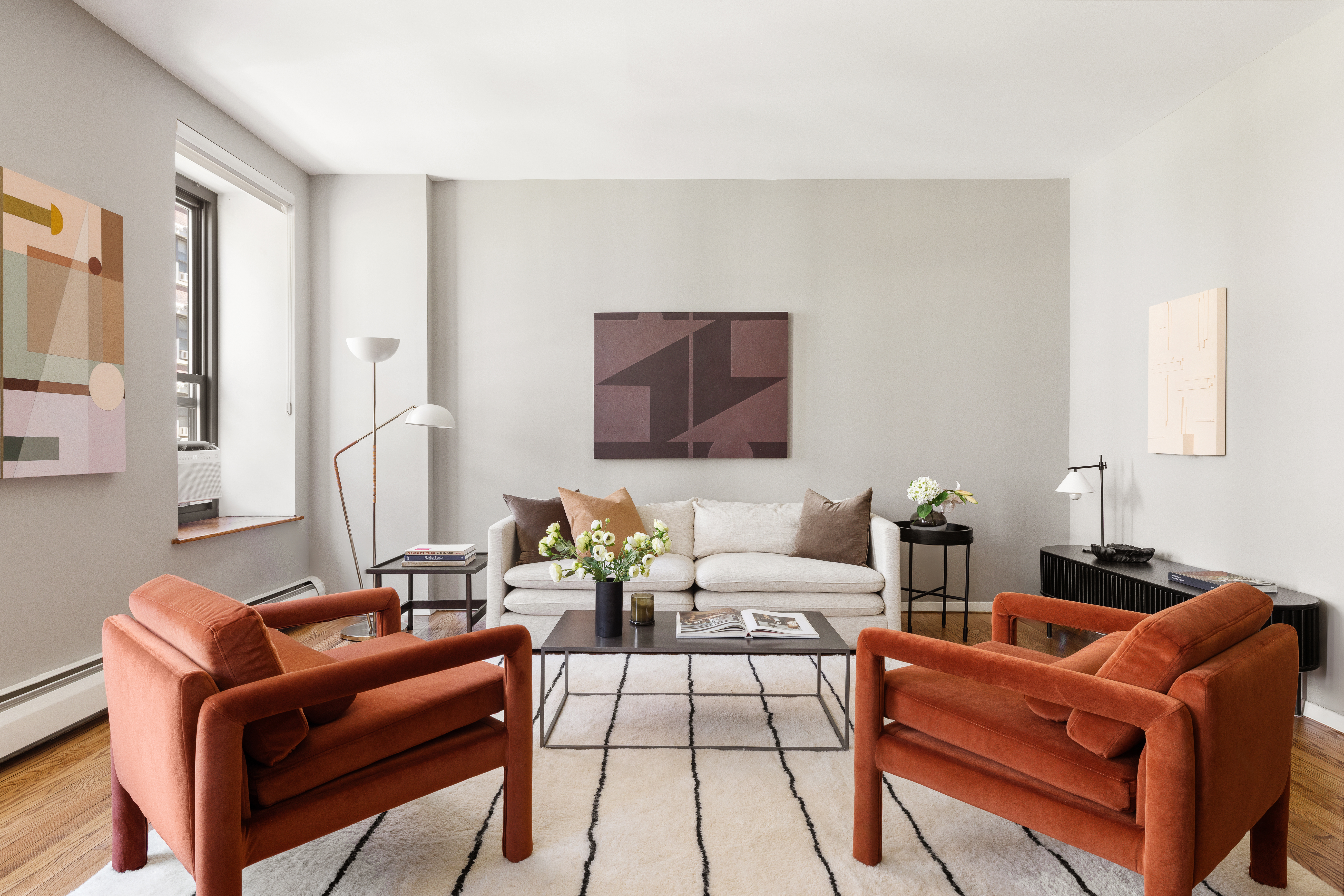 305 West 98th Street, Unit 4AN Manhattan, NY 10025 - Photo 2 of 10 a living room with furniture a rug and a lamp