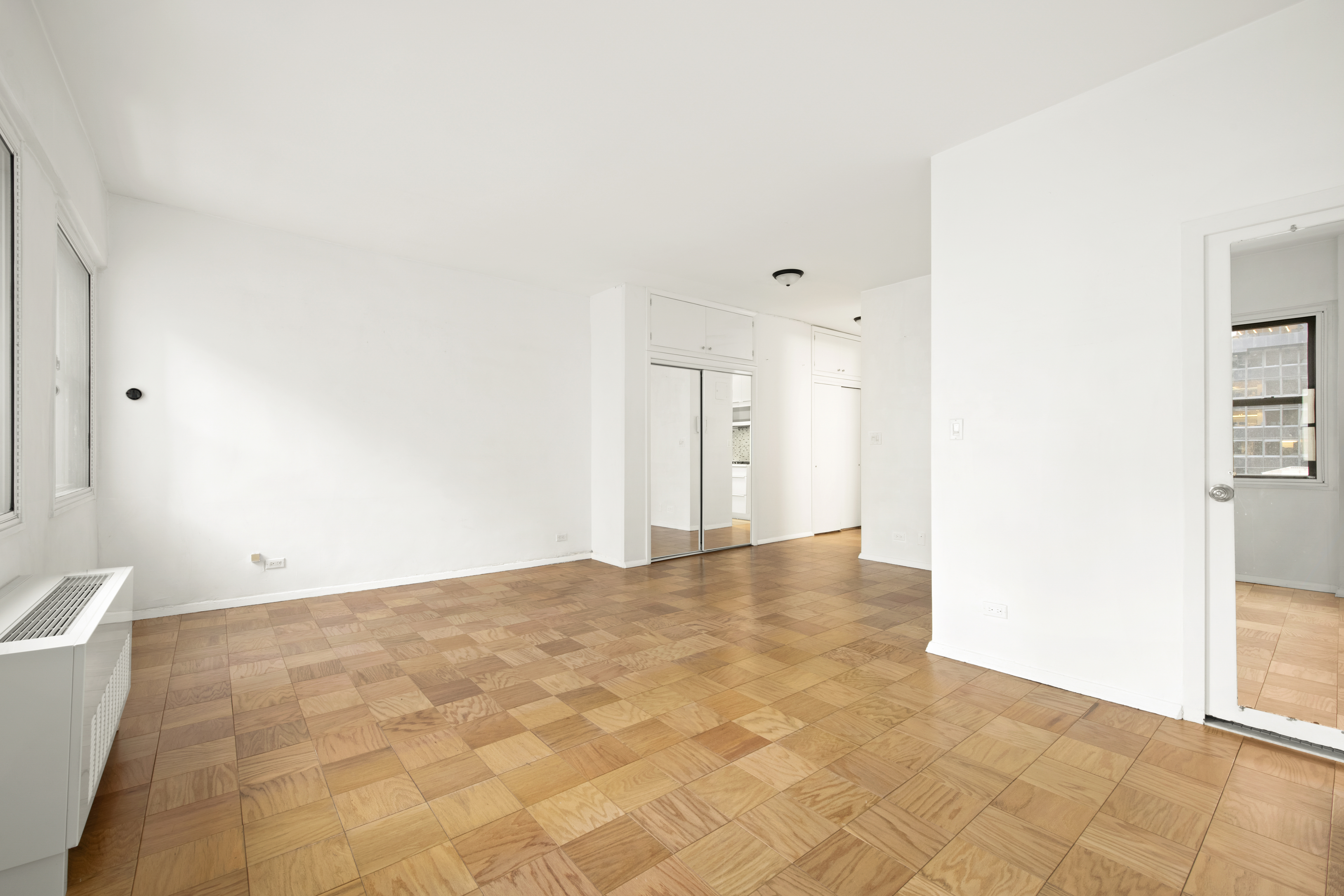 58 West 58th Street, Unit 10D Manhattan, NY 10019 - Photo 8 of 10 a view of an empty room