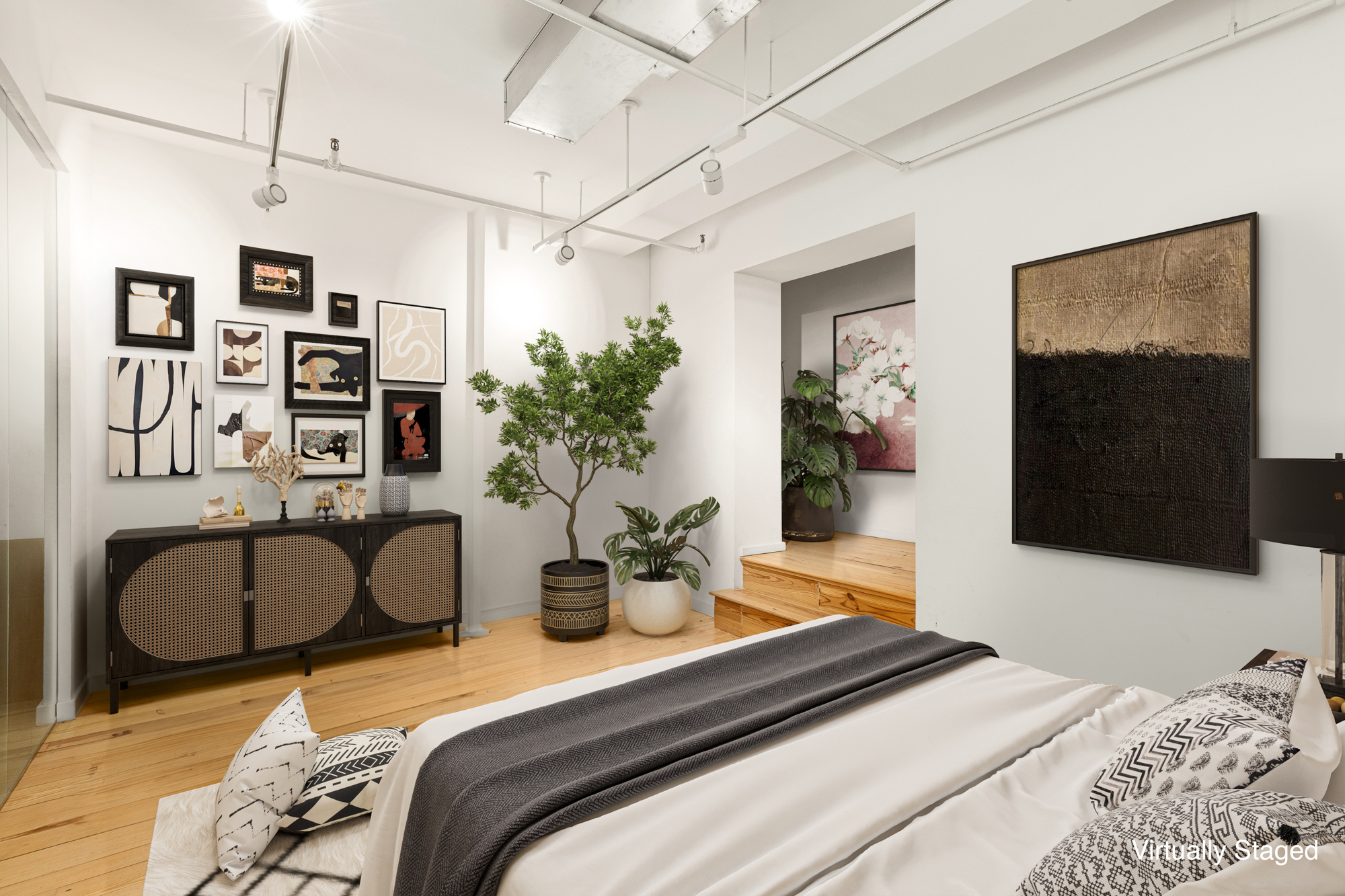 195 Bowery, Unit 2C Manhattan, NY 10002 - Photo 9 of 12 a bedroom with furniture and a flat screen tv