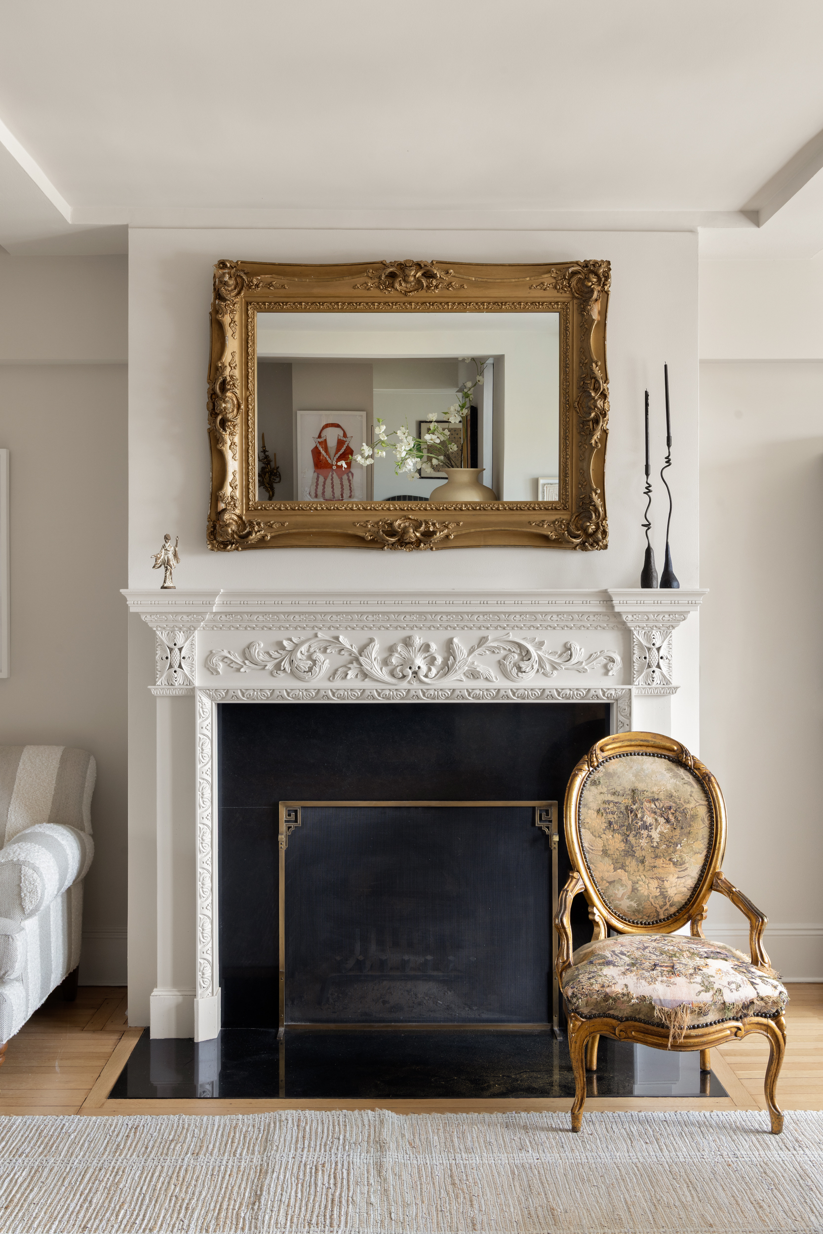 302 West 12th Street, Unit 11F Manhattan, NY 10014 - Photo 3 of 17 a living room with furniture and a fireplace