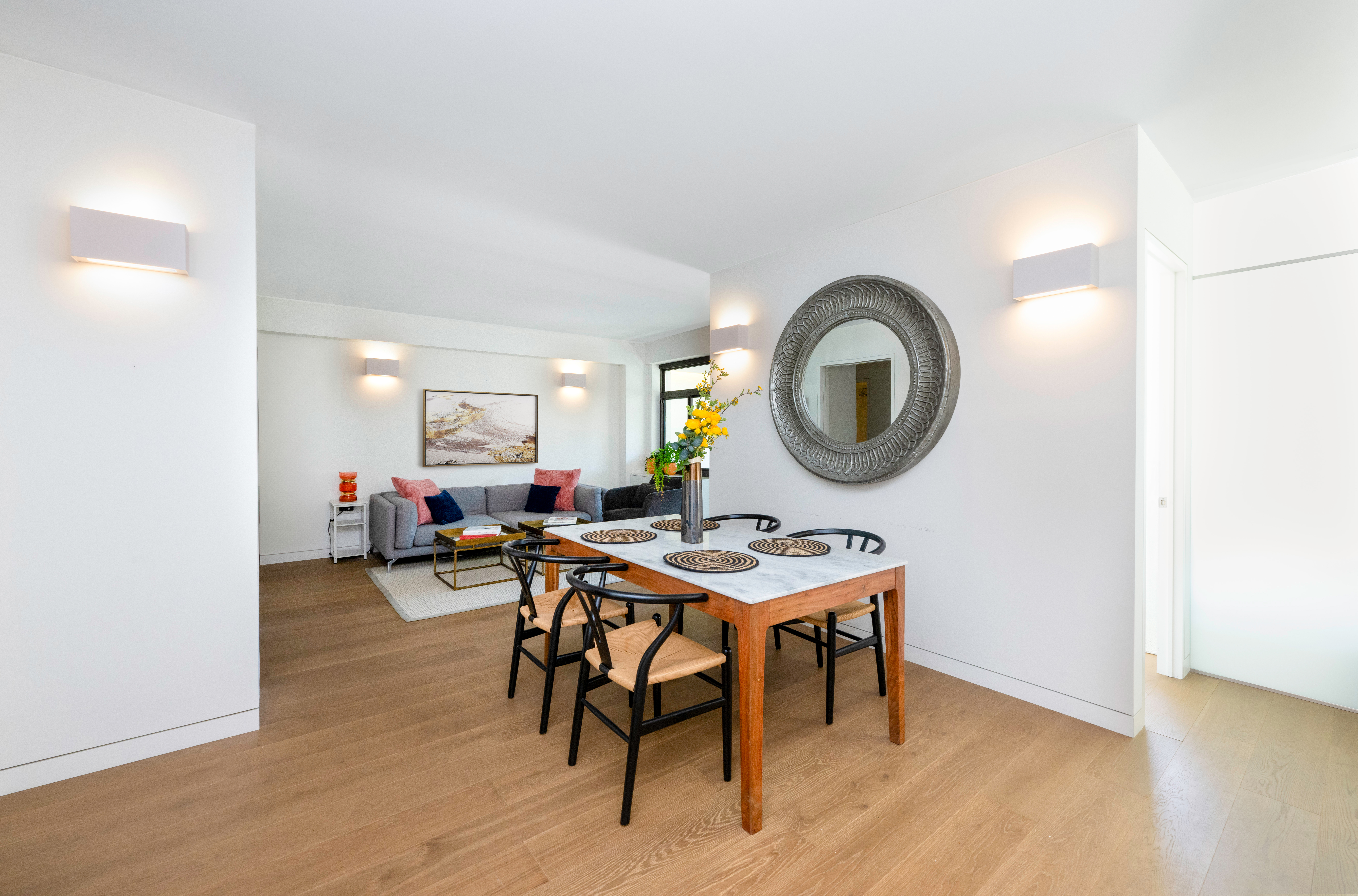124 East 79th Street, Unit 7D Manhattan, NY 10075 - Photo 16 of 25 a view of a dining room with furniture and chandelier