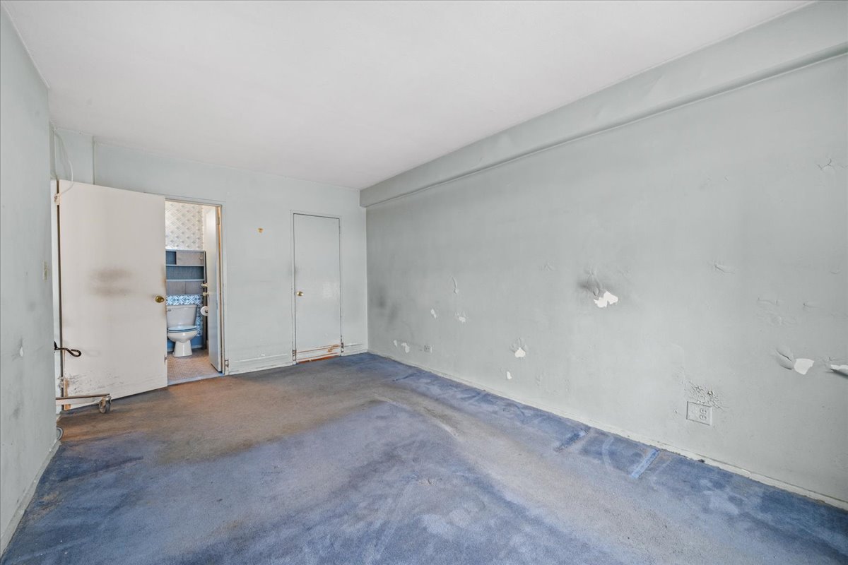448 Neptune Avenue, Unit 16K Brooklyn, NY 11224 - Photo 12 of 28 a view of an empty room