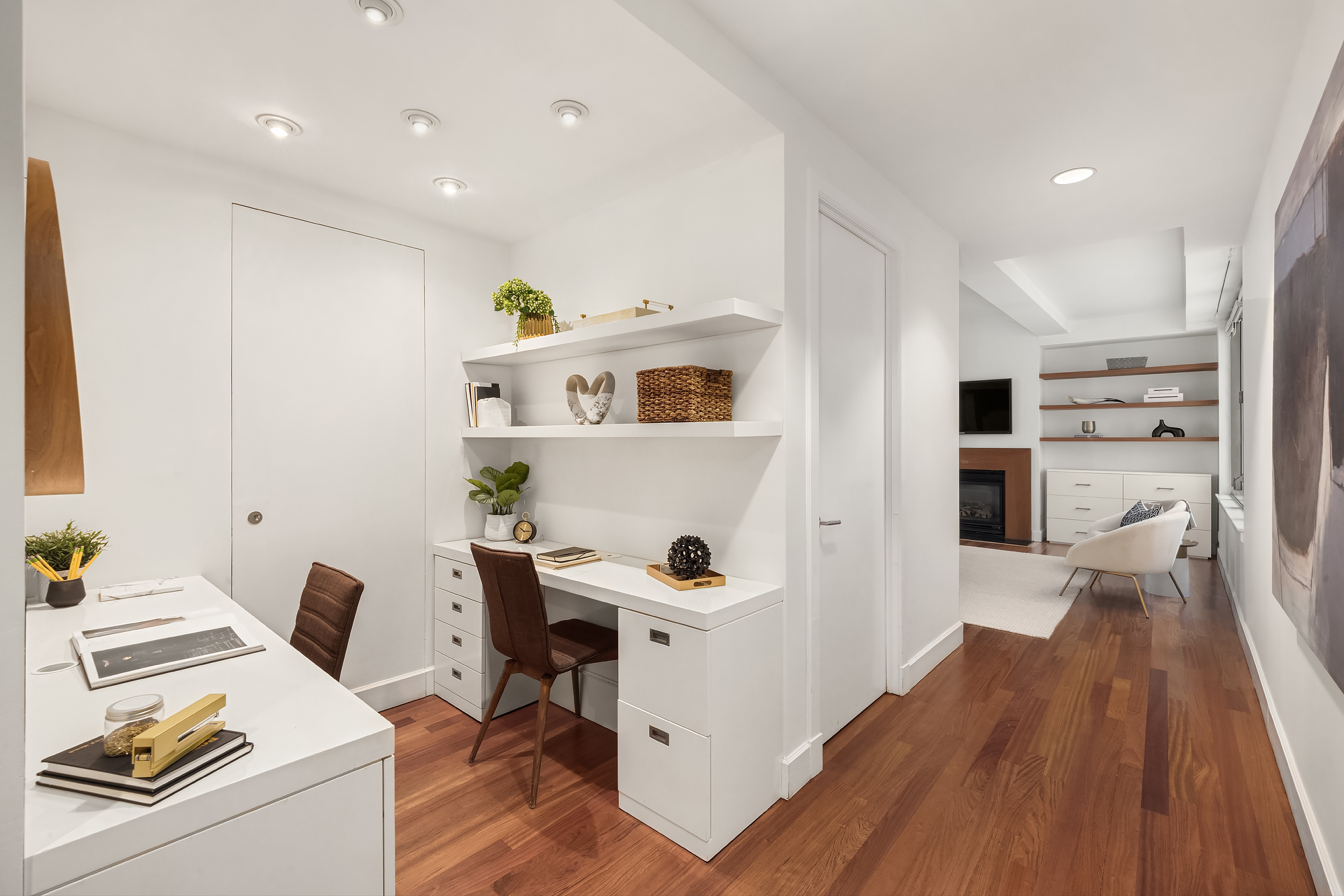 43 West 64th Street, Unit 7A Manhattan, NY 10023 - Photo 12 of 20 a workspace with furniture and wooden floor