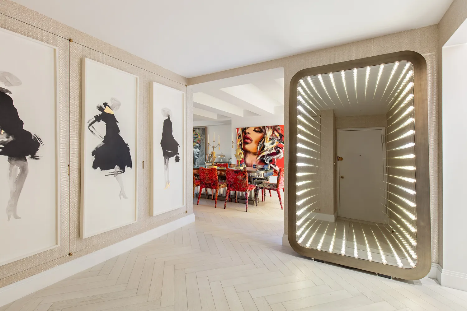 a bedroom with a large bed couch and a large window