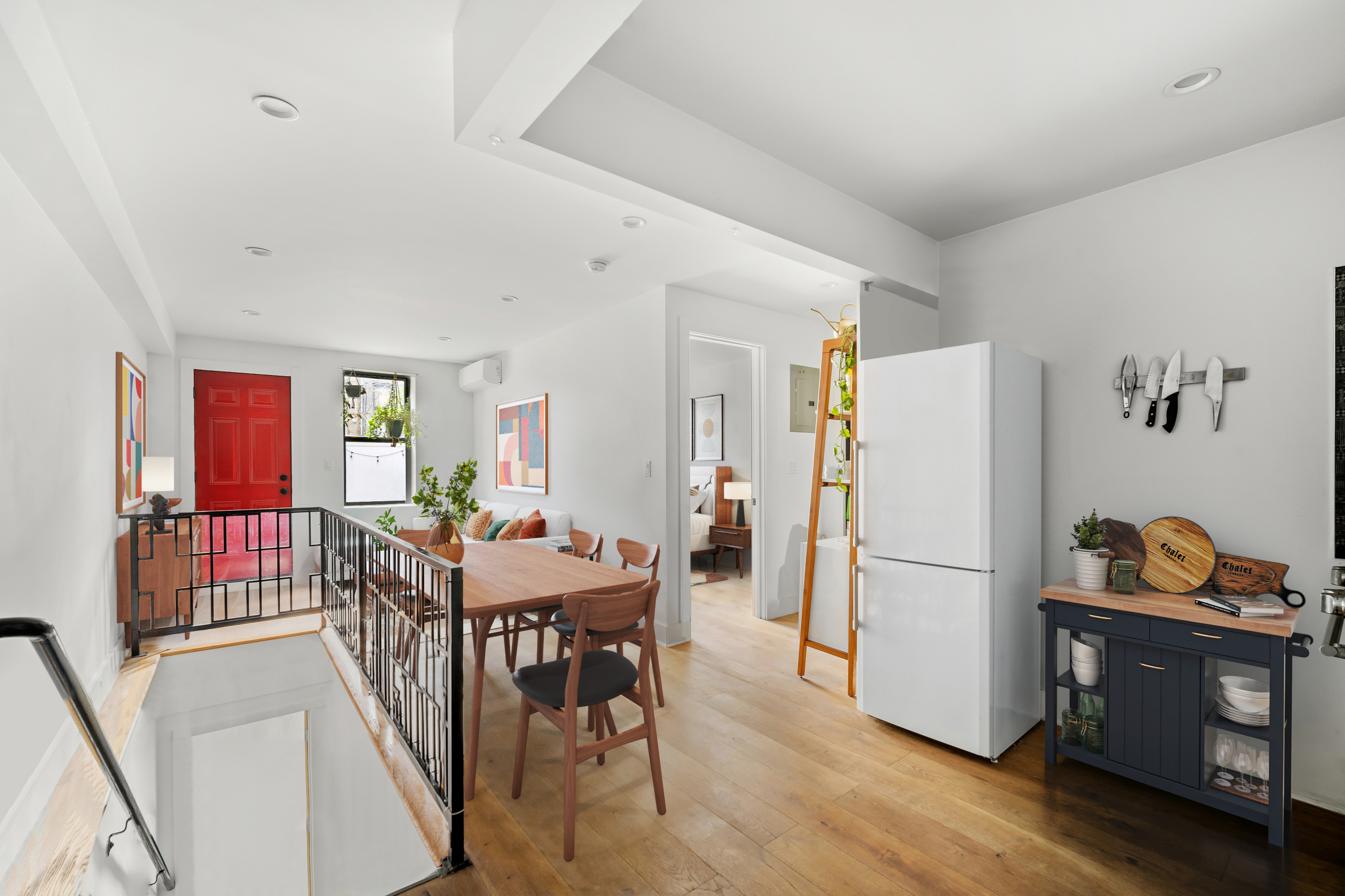 158 15th Street, Unit B1 Brooklyn, NY 11215 - Photo 3 of 8 a view of a dining room with furniture and wooden floor