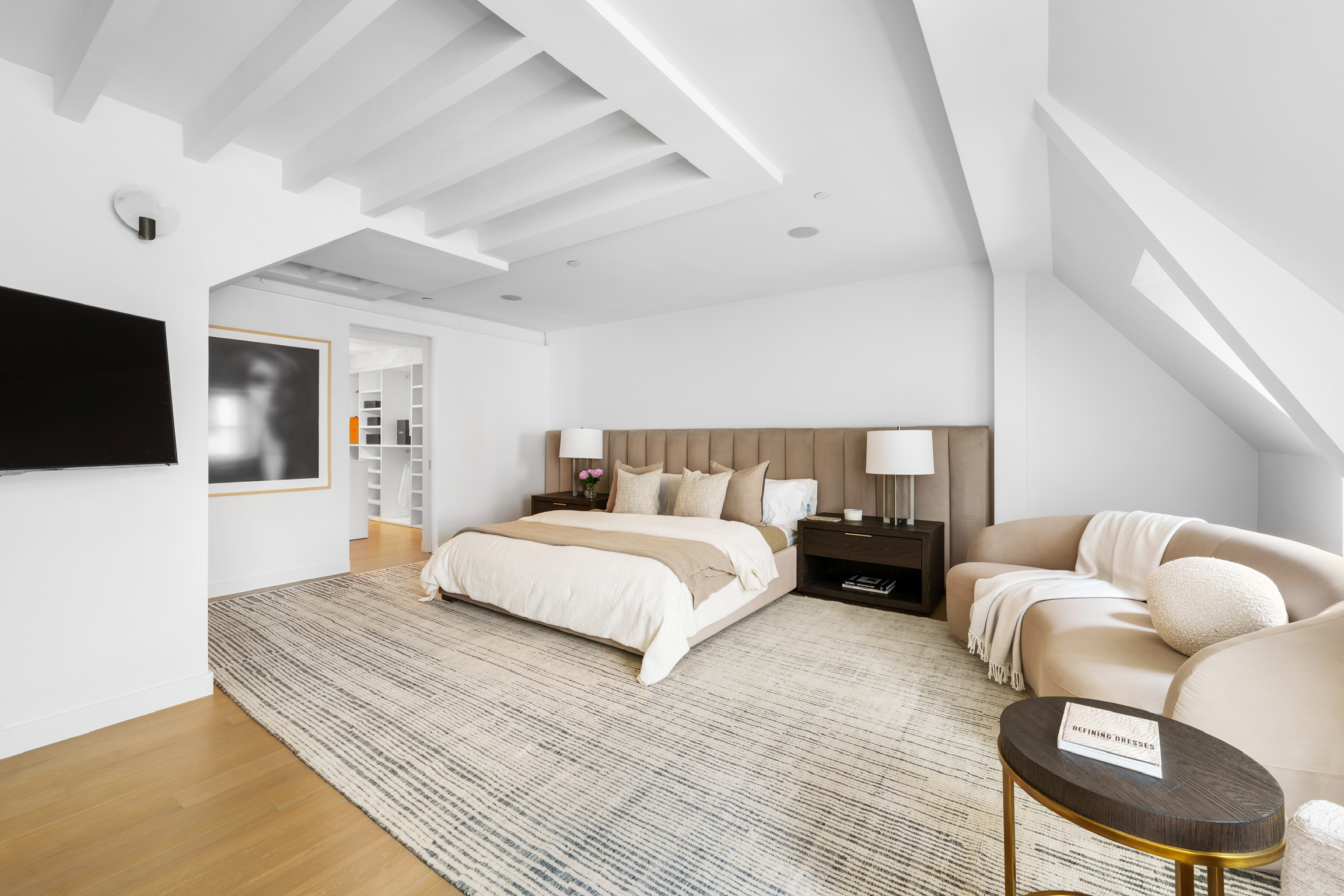 1200 Broadway, Unit PH89 Manhattan, NY 10001 - Photo 21 of 47 a bedroom with a large bed and a flat screen tv