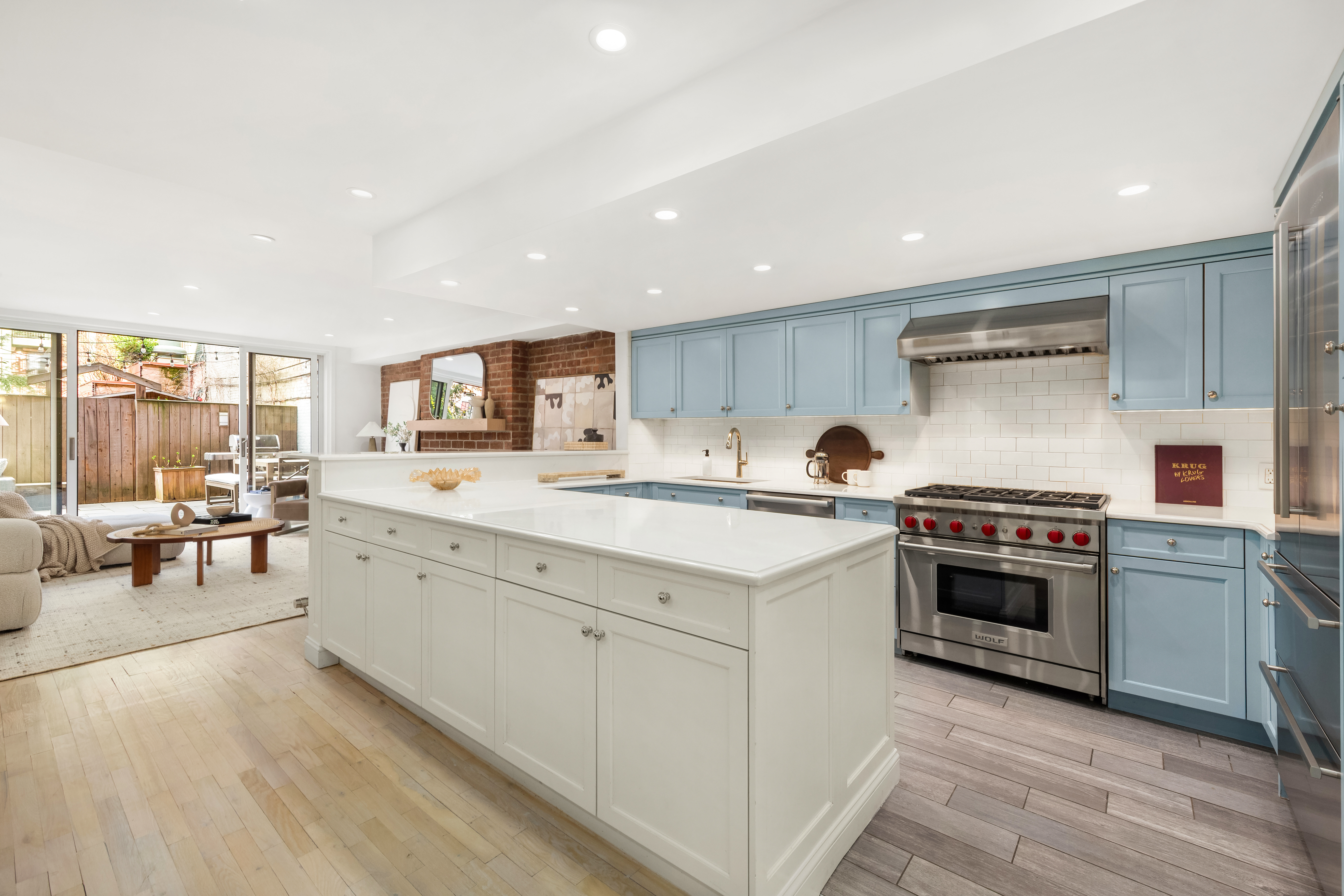 31 West 93rd Street, Unit 1D Manhattan, NY 10025 - Photo 2 of 18 a large kitchen with stainless steel appliances granite countertop a stove and a sink