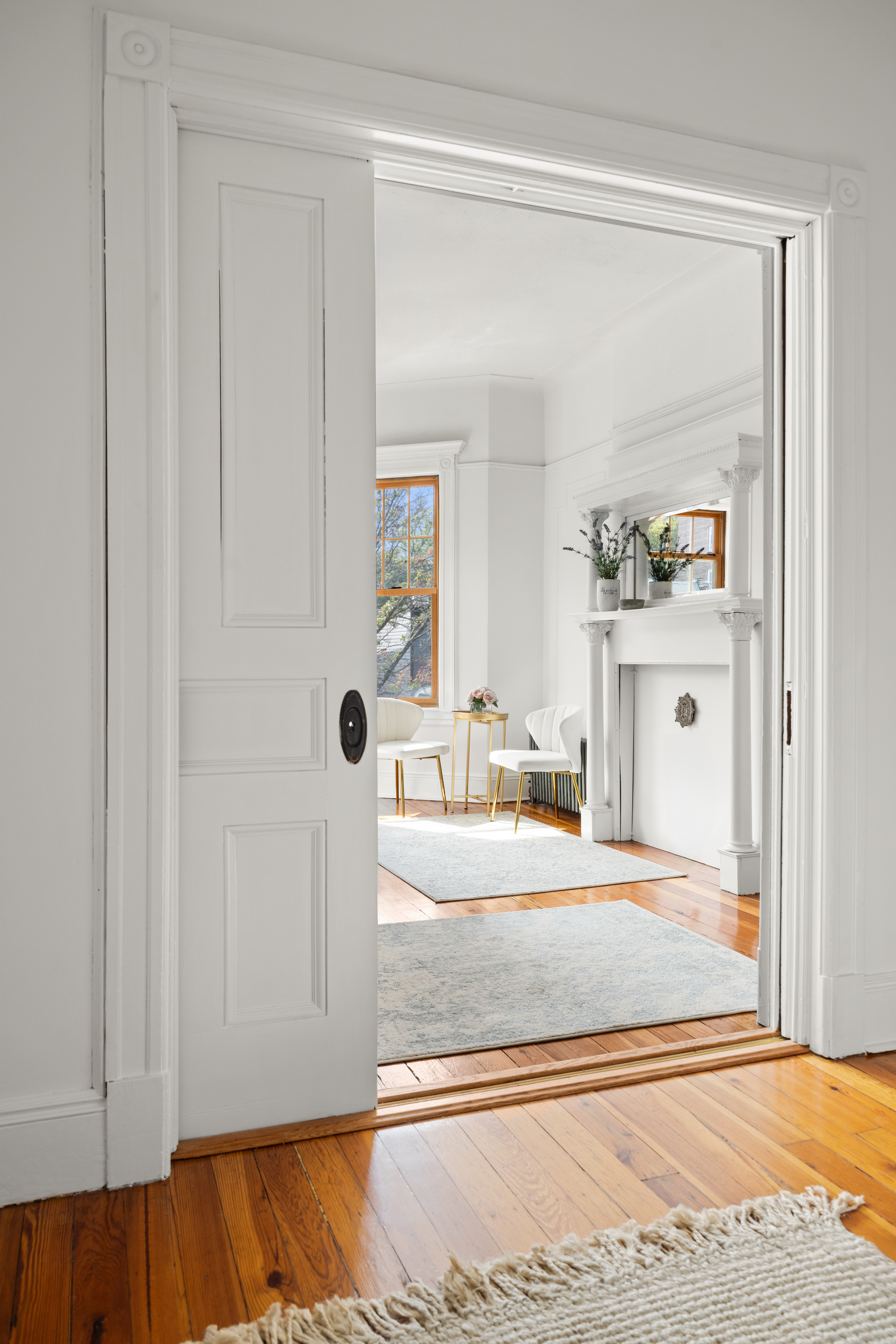 99 East 2nd Street Brooklyn, NY 11218 - Photo 13 of 24 a view of a bedroom with wooden floor and cabinet