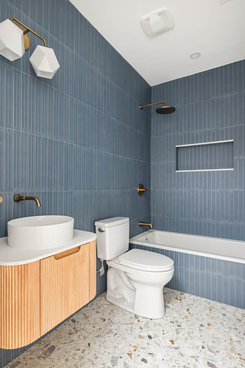 668 Decatur Street Brooklyn, NY 11233 - Photo 10 of 14 a bathroom with a sink a toilet and shower