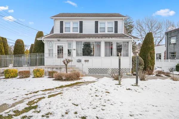 a view of a house with snow on the floor
