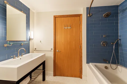 a bathroom with a sink and a tub