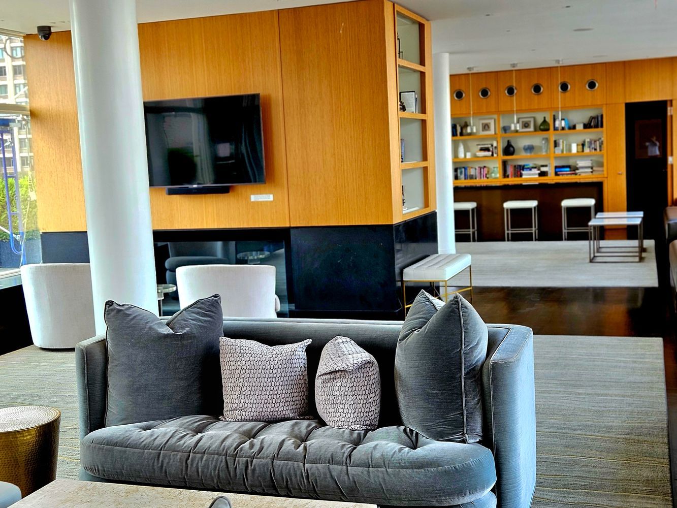 a living room with furniture fireplace and a flat screen tv