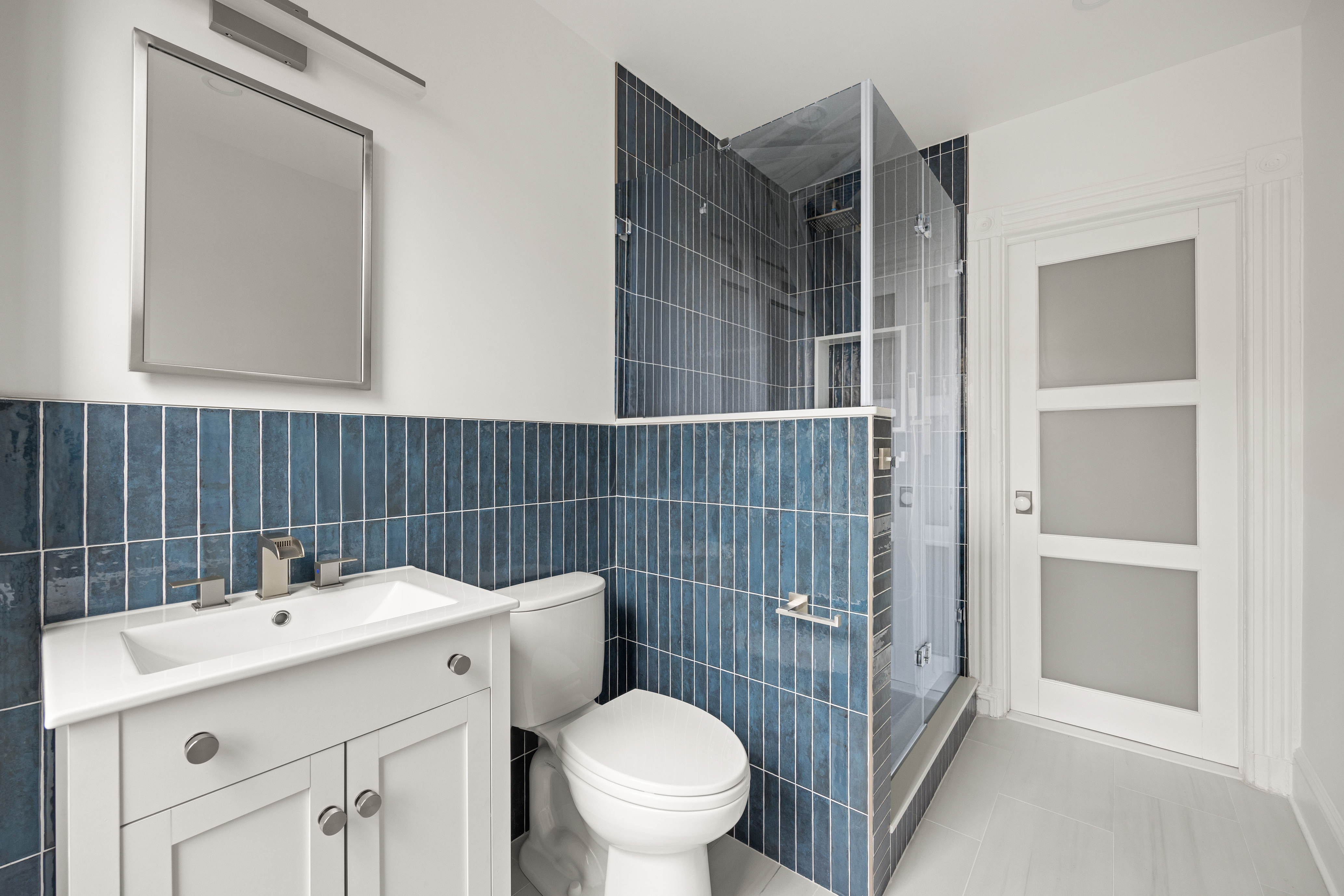 485 1st Street, Unit 2 Brooklyn, NY 11215 - Photo 14 of 17 a bathroom with a sink toilet and shower