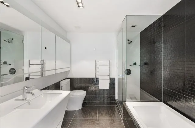 a bathroom with a bathtub and a sink