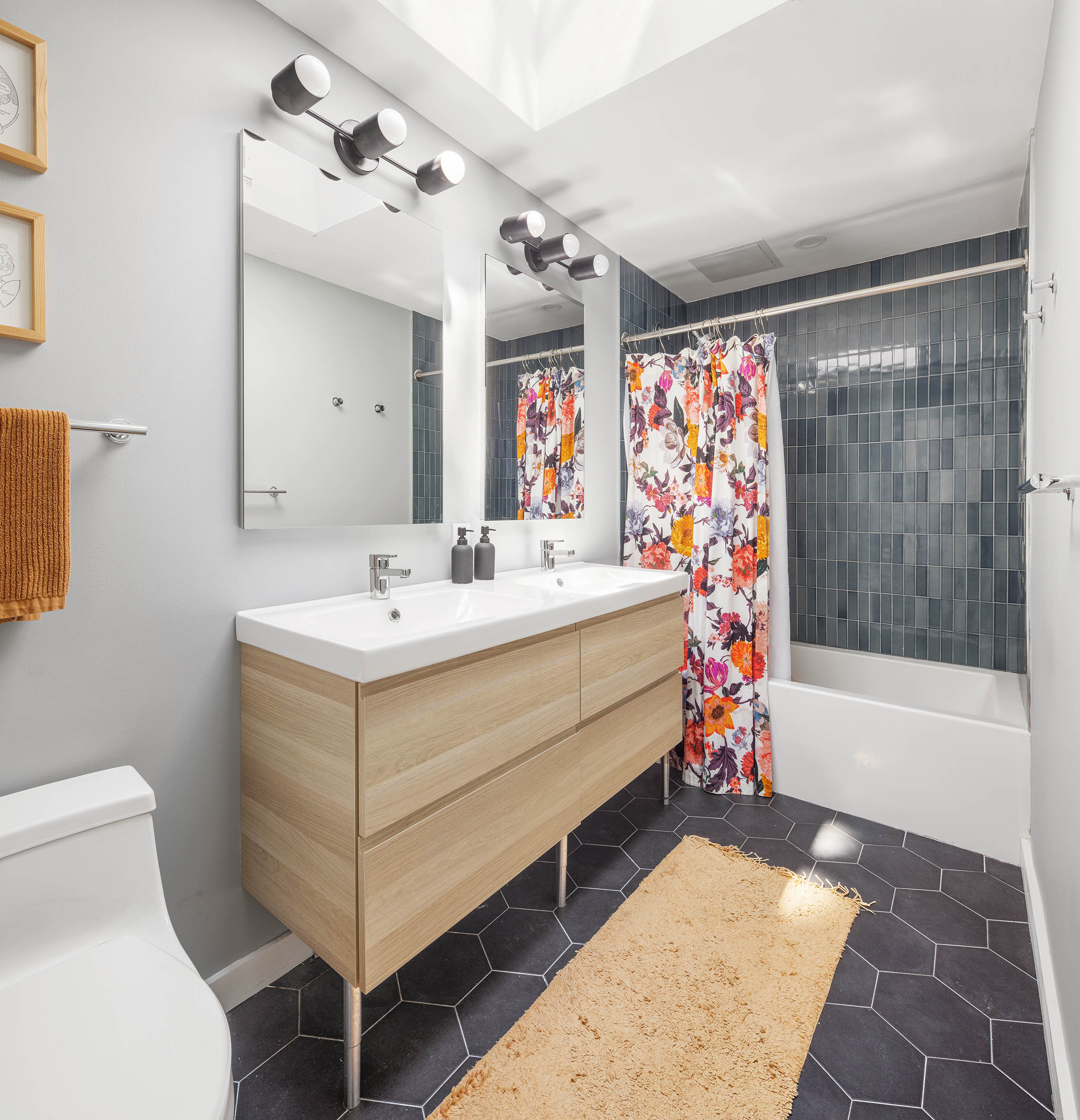 379 Monroe Street Brooklyn, NY 11221 - Photo 10 of 15 a bathroom with a sink a toilet and bathtub