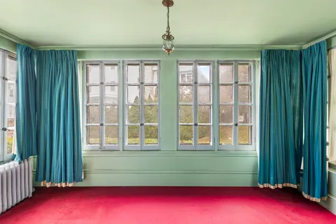 a view of an entryway with a chandelier