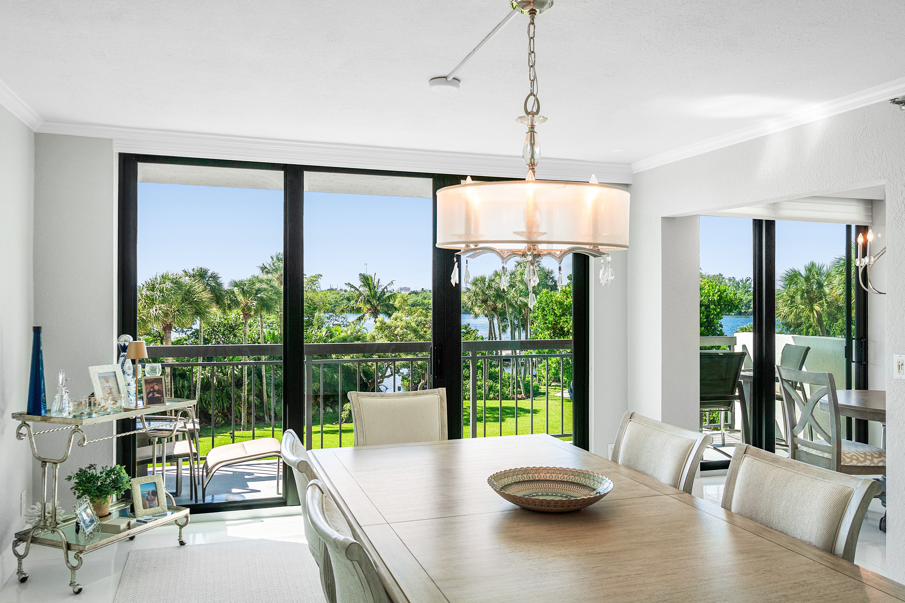 2003 North Ocean Boulevard, Unit 305 Boca Raton, FL 33431 - Photo 17 of 56 a living room with furniture and a large window