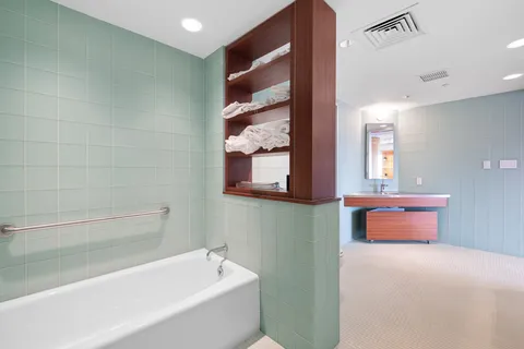 a view of a building with a bench in front of building