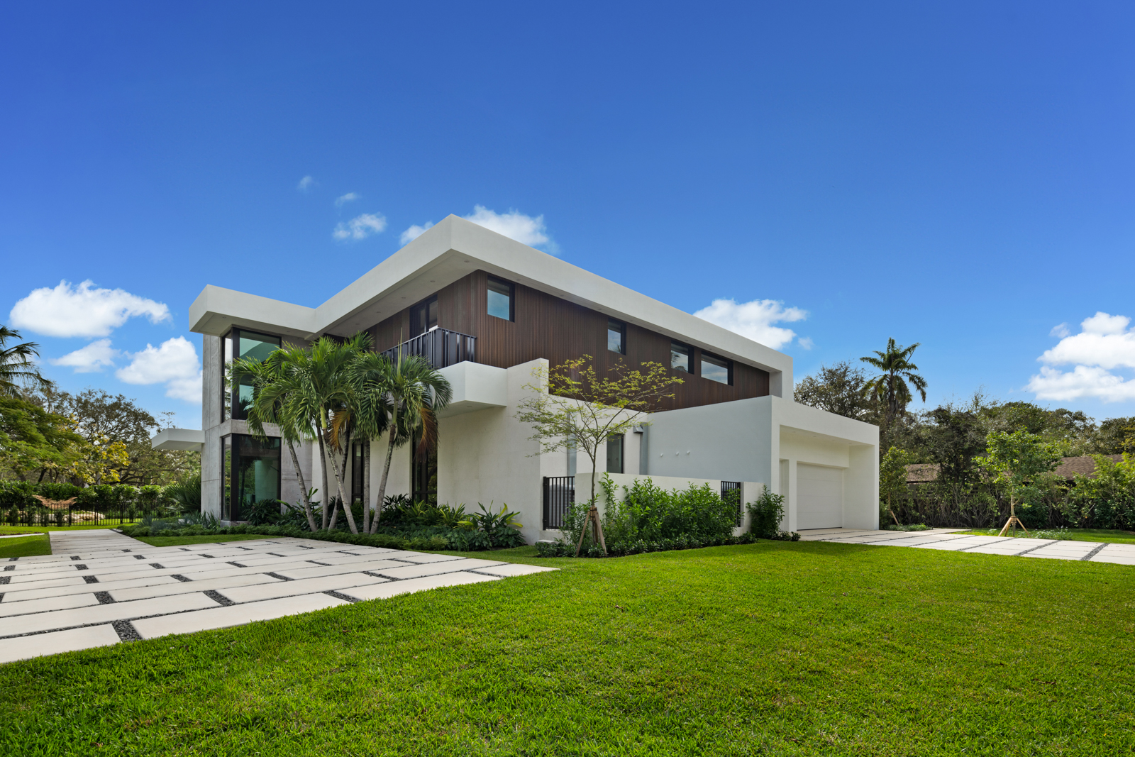 6920 Southwest 124th Street Pinecrest, FL 33156 - Photo 44 of 48 a front view of a house with a yard
