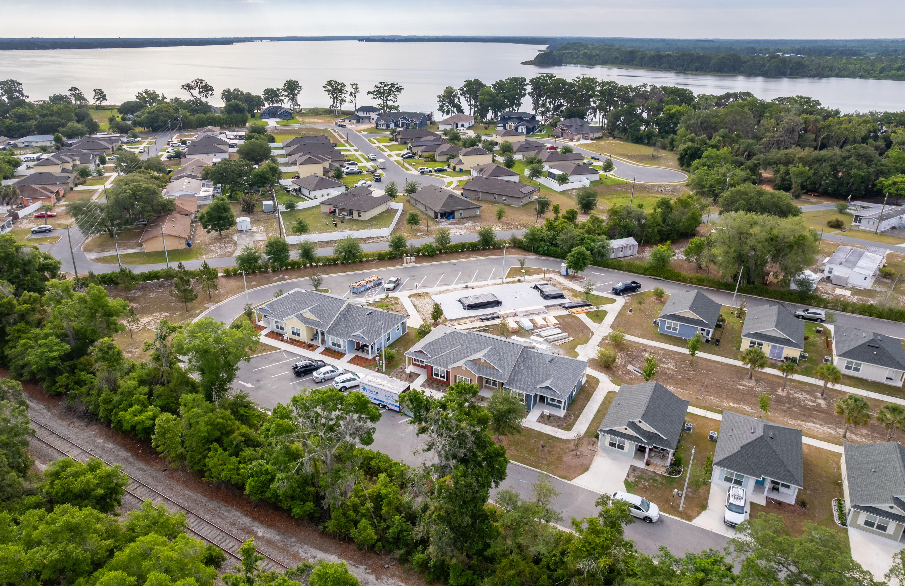 1360 Cottage Circle Tavares, FL 32778 - Photo 21 of 25 an aerial view of a city with lots of residential buildings