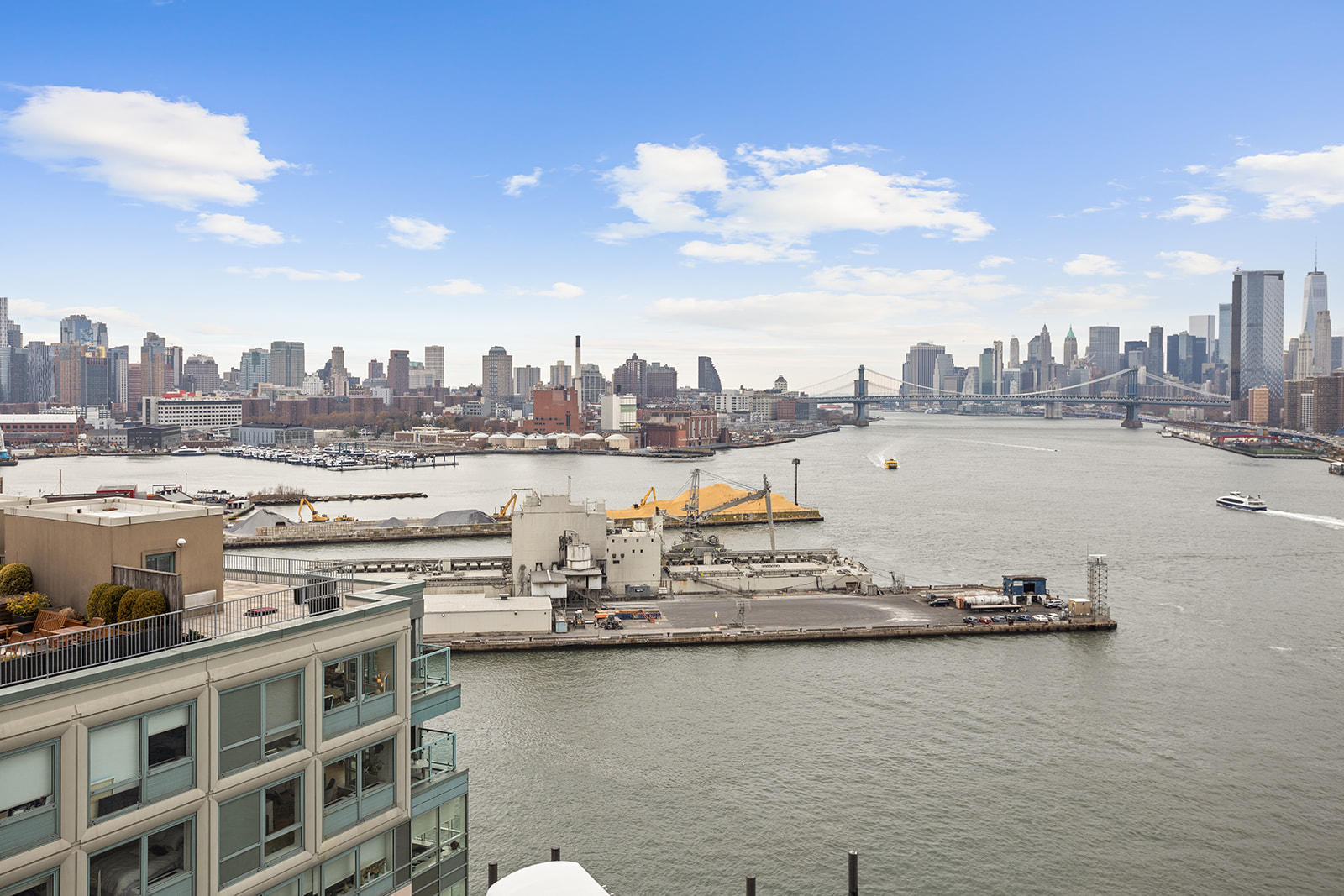 440 Kent Avenue, Unit F18 Brooklyn, NY 11249 - Photo 9 of 16 a view of a water and a mountain