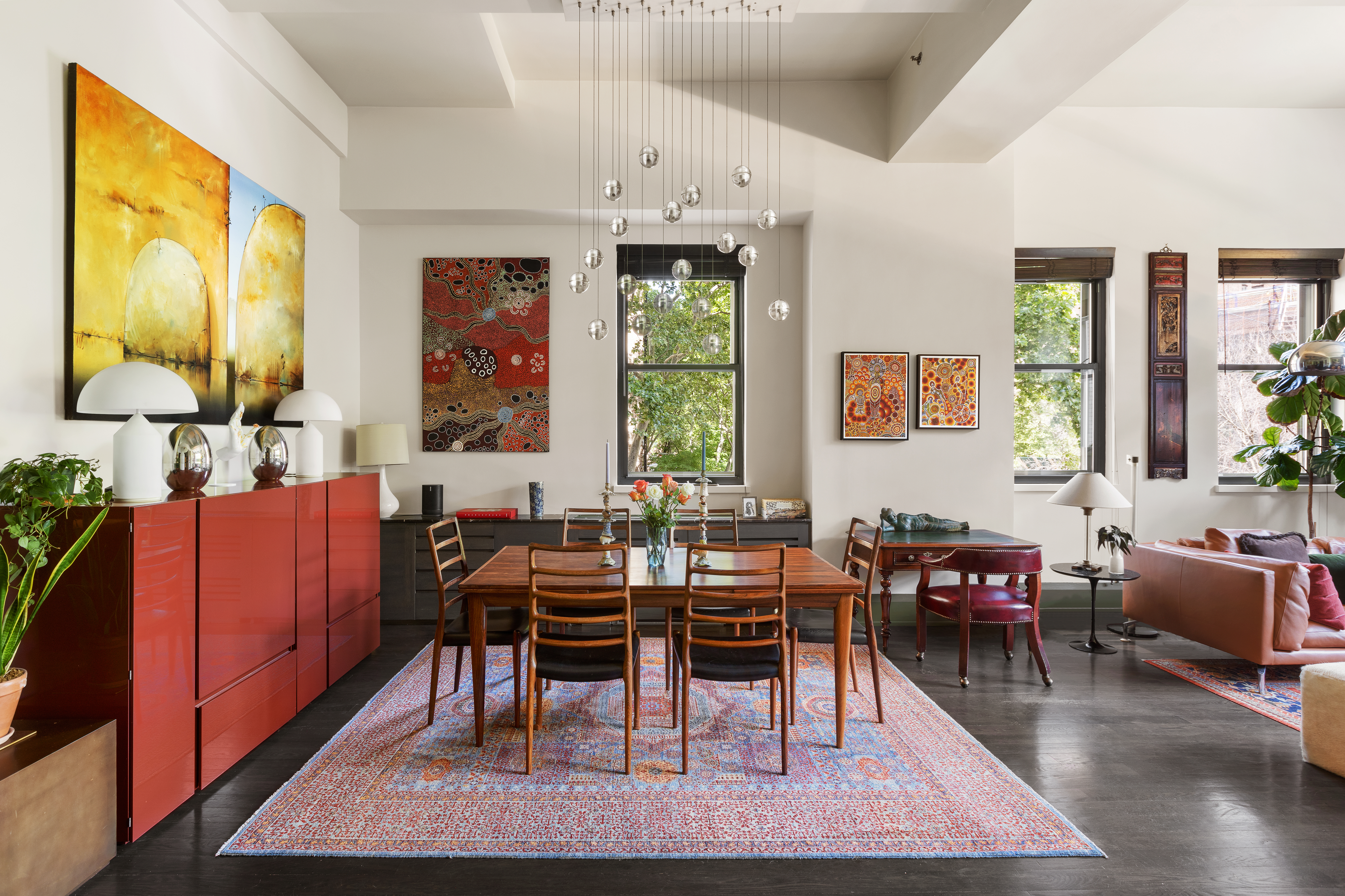 263 9th Avenue, Unit 2E Manhattan, NY 10001 - Photo 2 of 12 a view of a dining room with furniture window and wooden floor