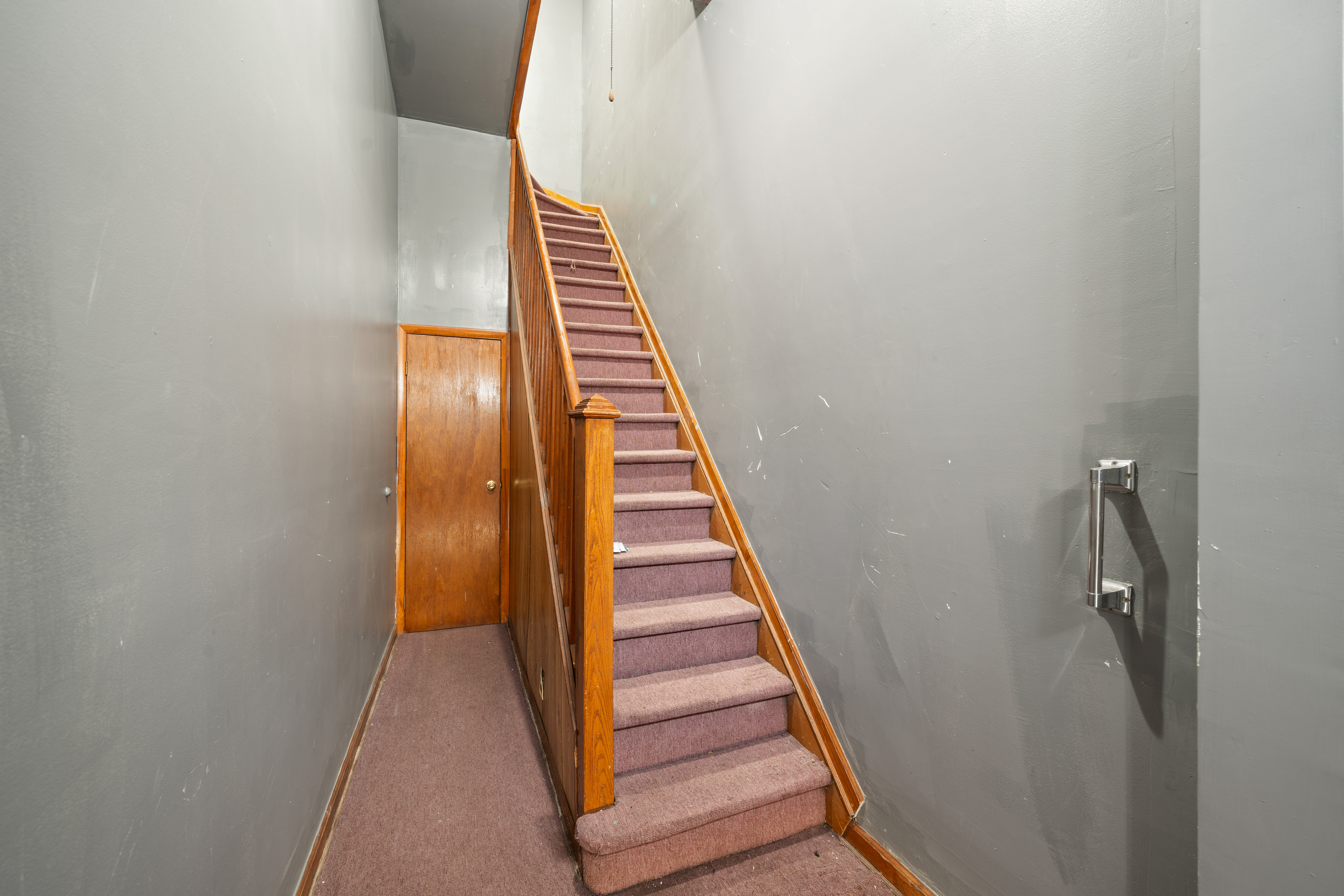 162 Mallory Avenue Jersey City, NJ 07304 - Photo 10 of 29 a view of a hallway with wooden floor and entryway