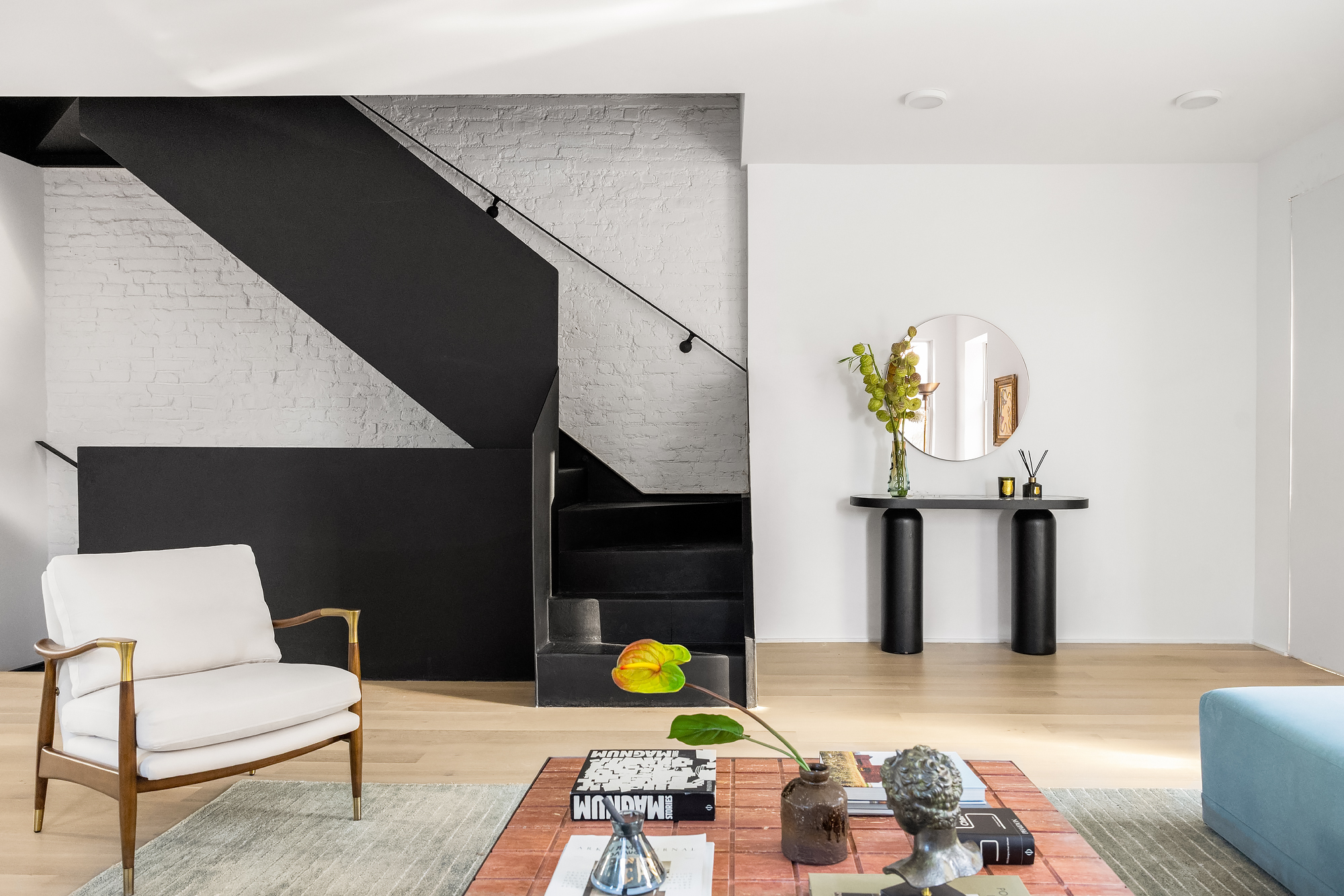 61 South 4th Street Brooklyn, NY 11249 - Photo 2 of 29 a living room with furniture and wooden floor
