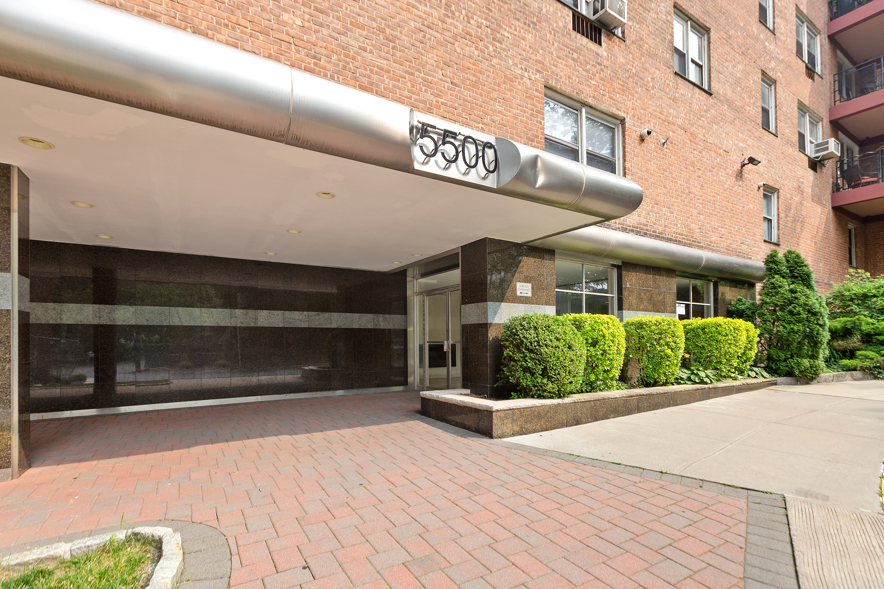 5500 Fieldston Road, Unit 7JJ Bronx, NY 10471 - Photo 1 of 1 a view of a building with a street