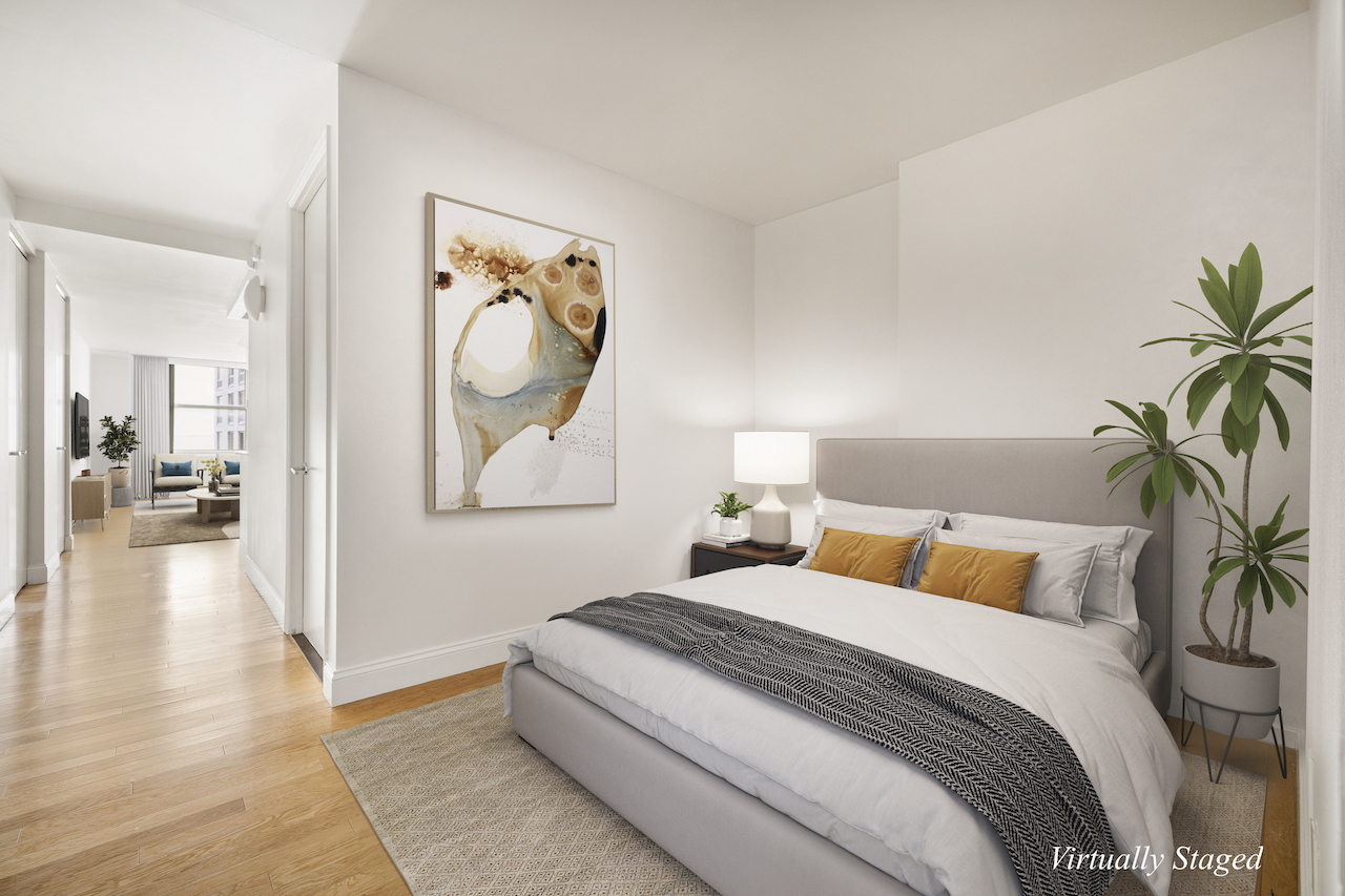 88 Greenwich Street, Unit 1014 Manhattan, NY 10006 - Photo 5 of 14 a bedroom with bed and a painting on the wall