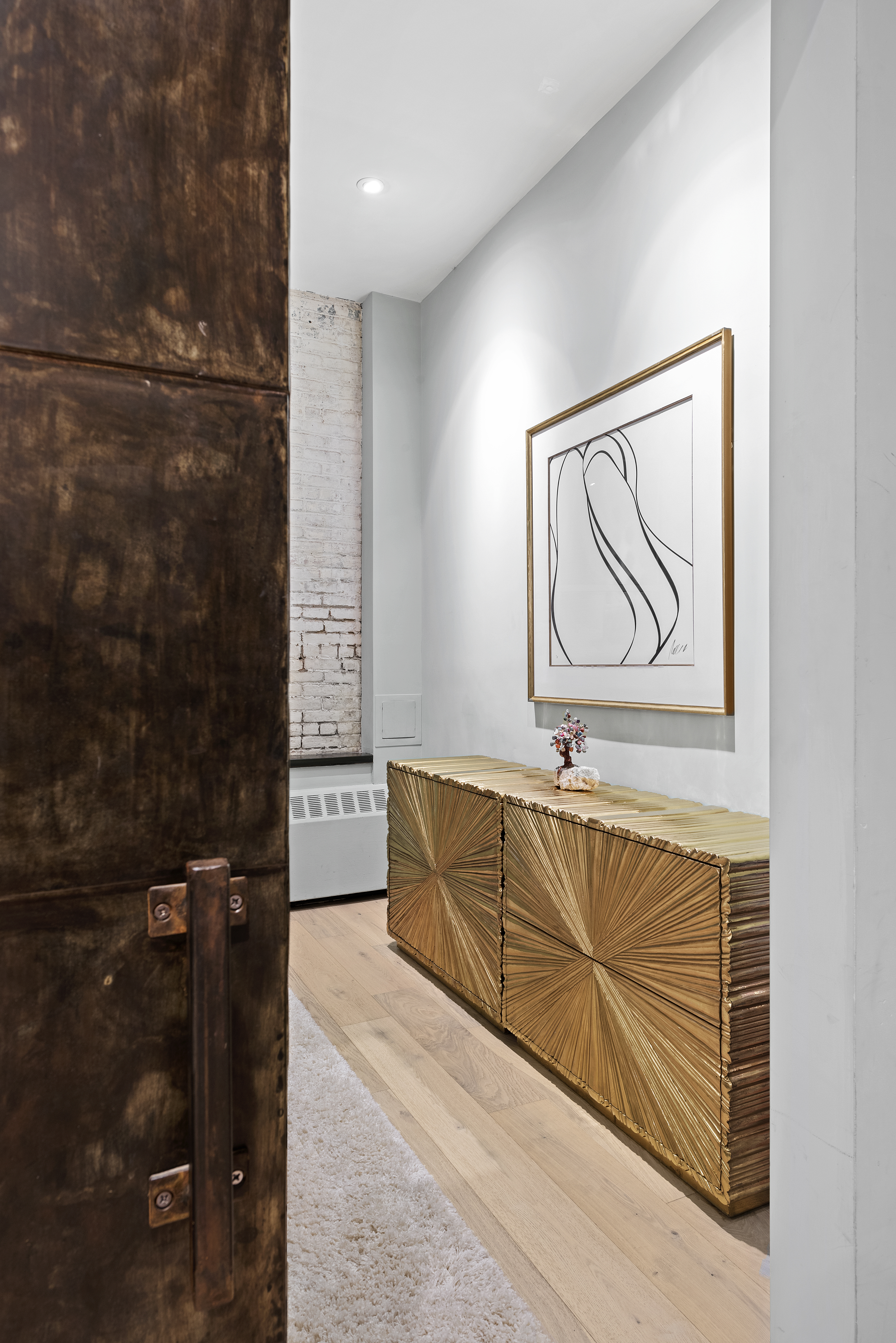 10 Bleecker Street, Unit 1B Manhattan, NY 10012 - Photo 10 of 16 a bathroom with a bathtub and shower