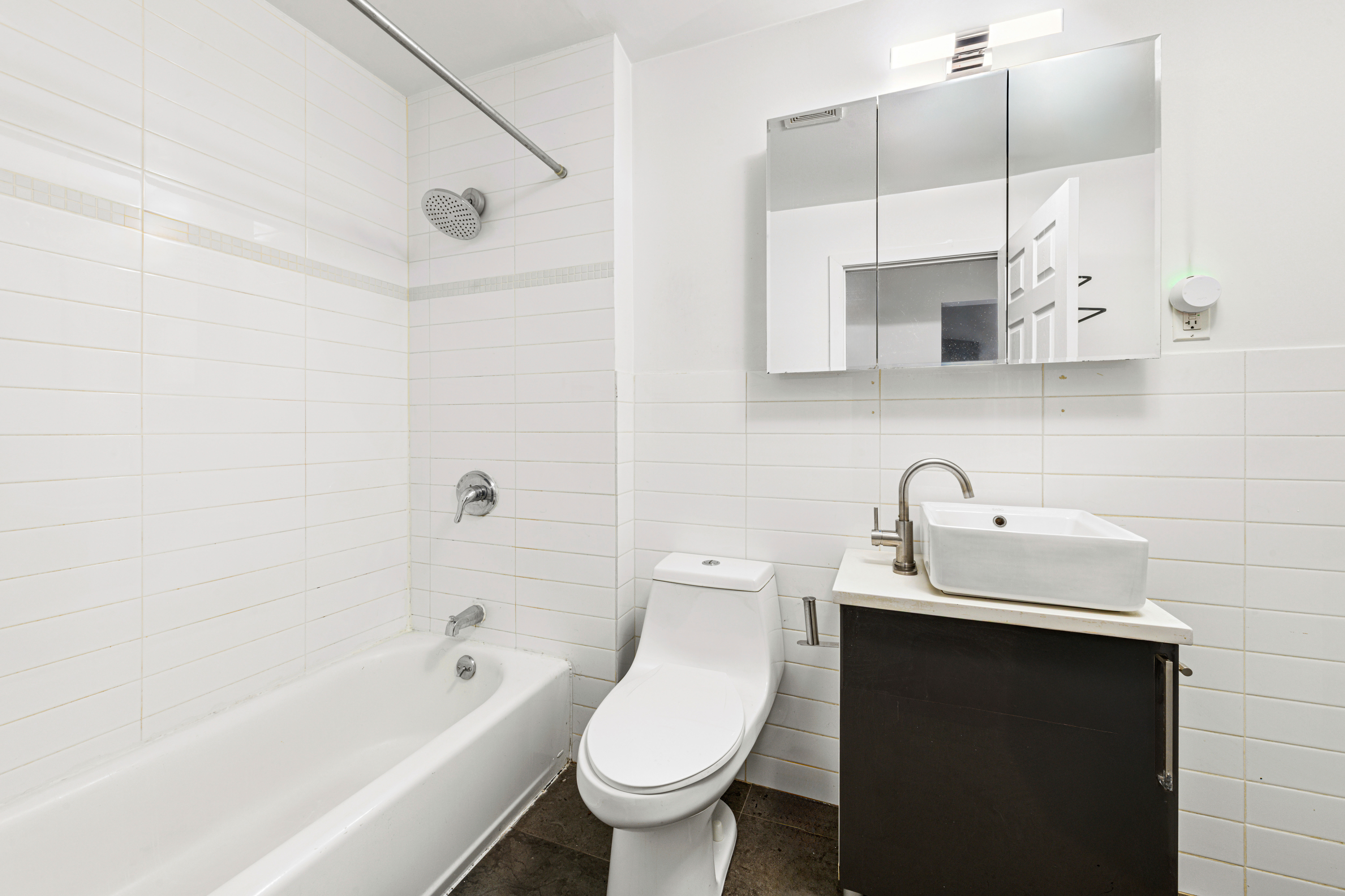 155 A 9th Street, Unit 1 Brooklyn, NY 11231 - Photo 9 of 15 a bathroom with a sink toilet and shower