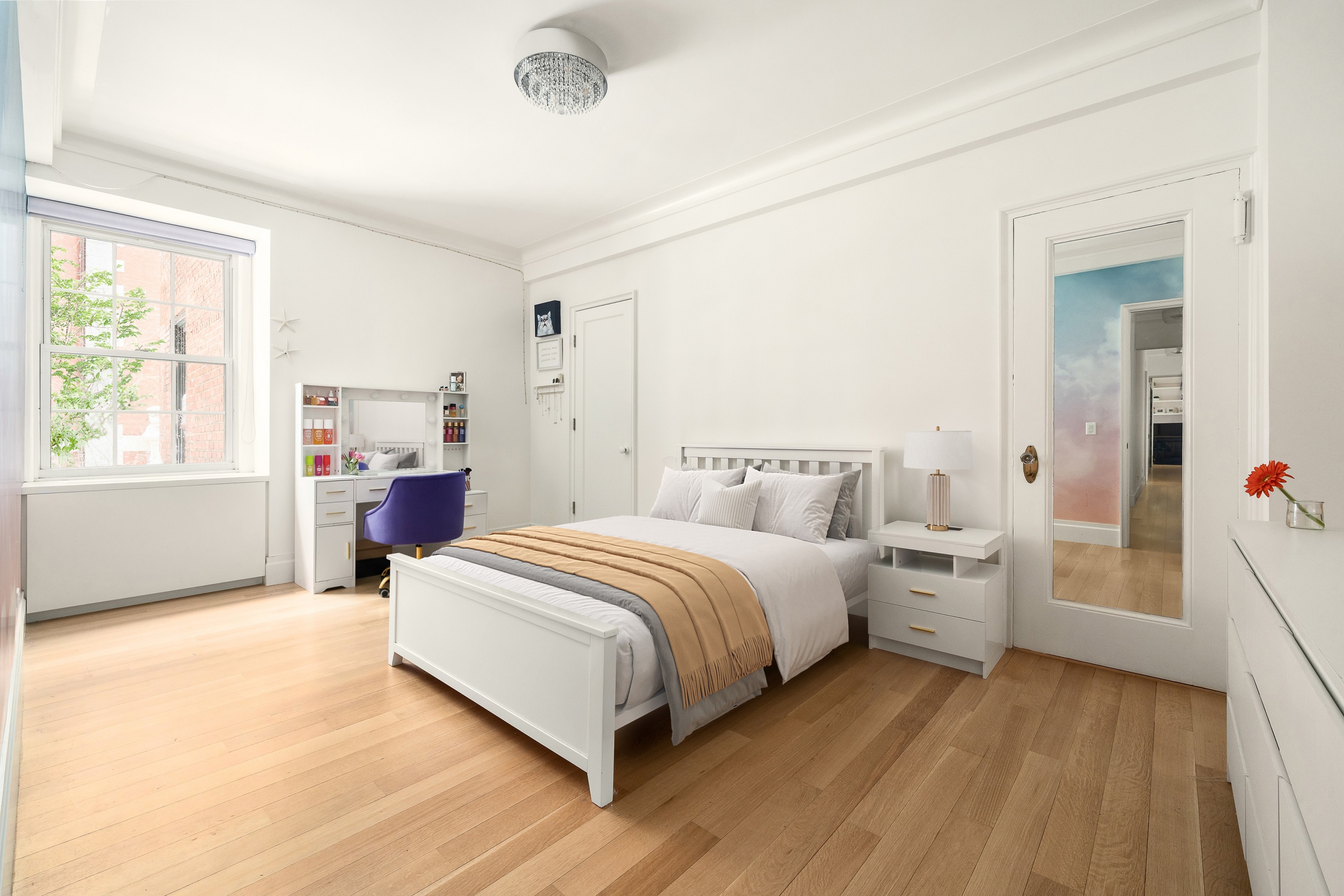 160 Henry Street, Unit 3C Brooklyn, NY 11201 - Photo 10 of 18 a spacious bedroom with a bed and a large window
