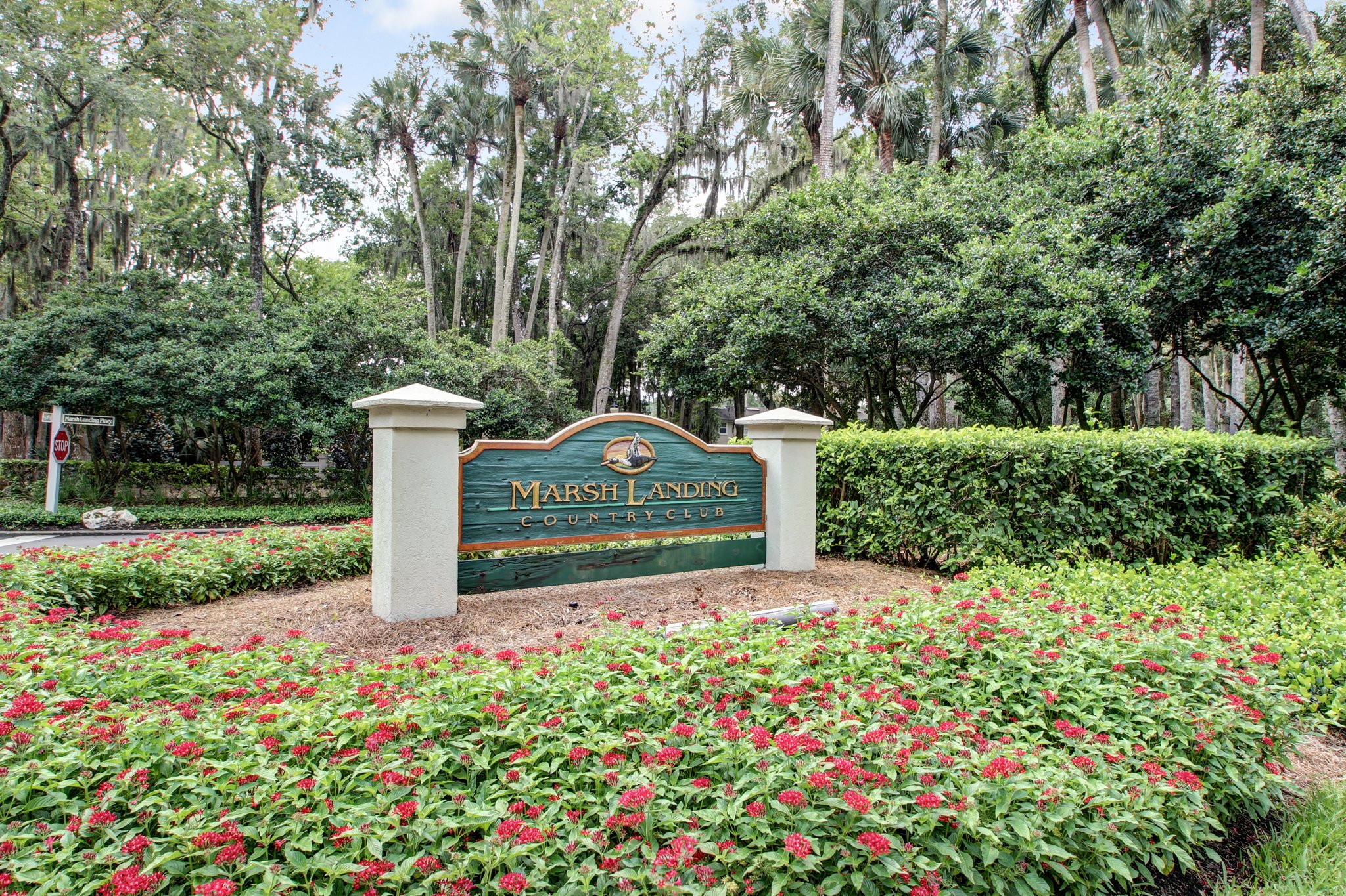 24624 Harbour View Drive Ponte Vedra Beach, FL 32082 - Photo 148 of 186 a front view of a house with a yard and fountain in middle