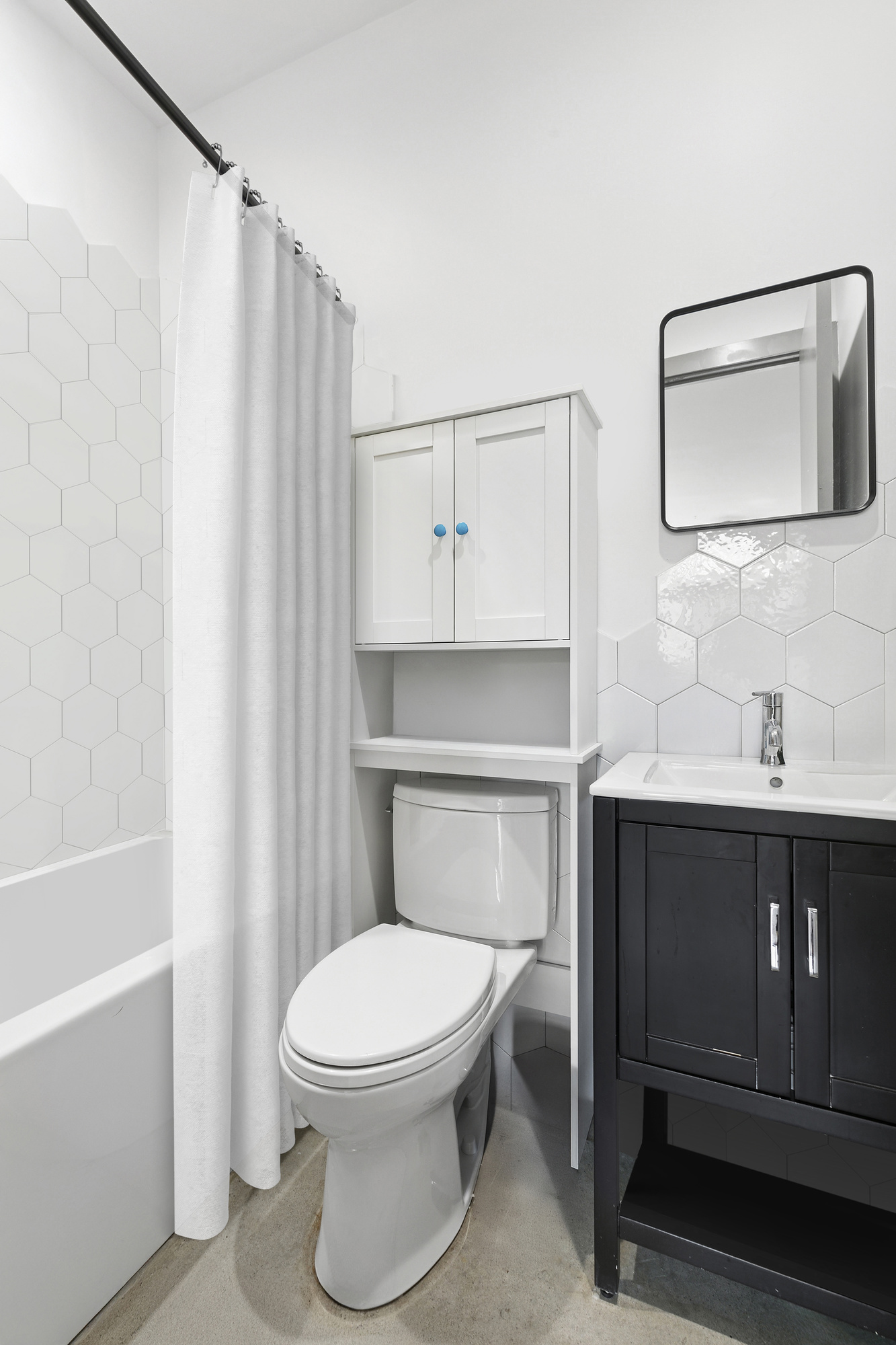 30 Belvidere Street, Unit 2B Brooklyn, NY 11206 - Photo 6 of 7 a bathroom with a toilet a sink and bathtub