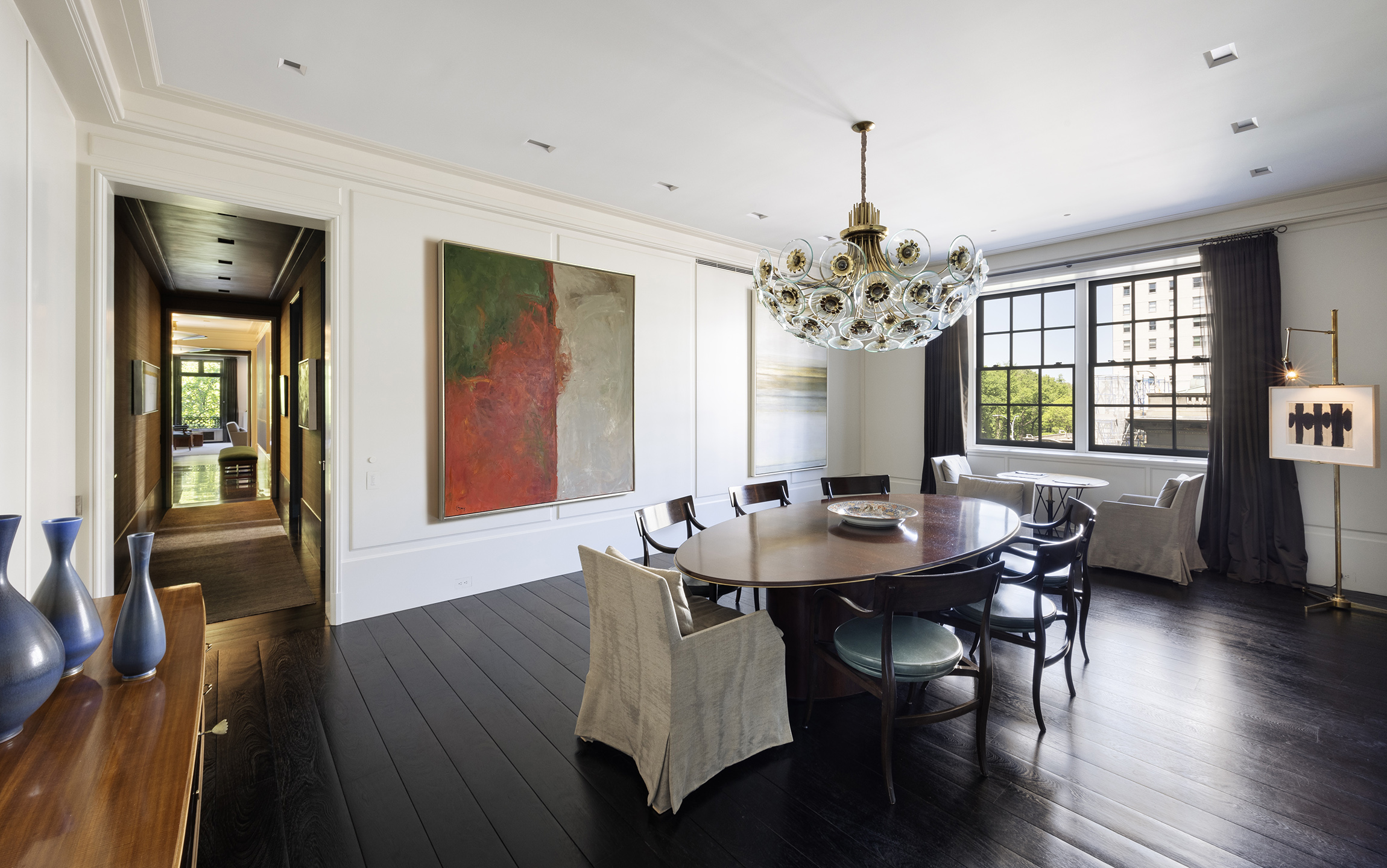2 East 70th Street, Unit 4A Manhattan, NY 10021 - Photo 10 of 17 a view of a dining room with furniture window and wooden floor