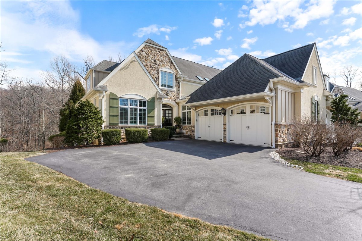 248 Valley Ridge Road Haverford, PA 19041 - Photo 2 of 44 a view of a house with a yard and garage