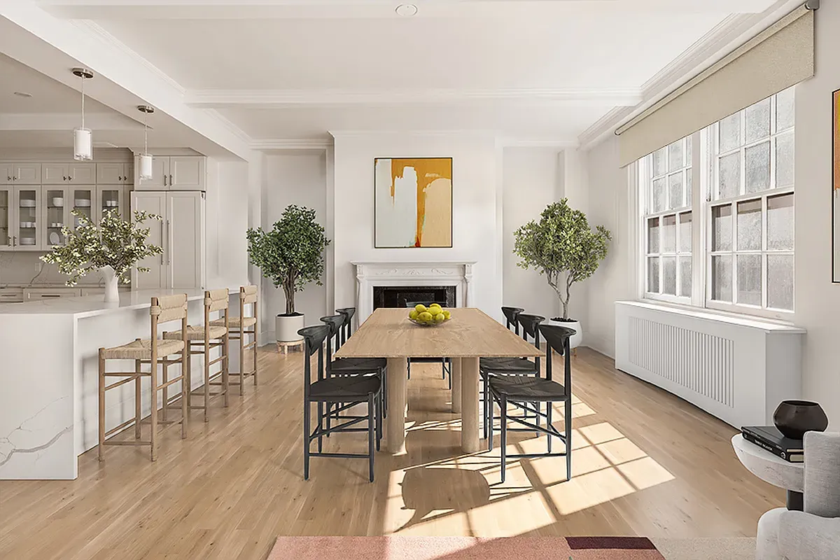 a dining room with wooden floor a glass table and chairs