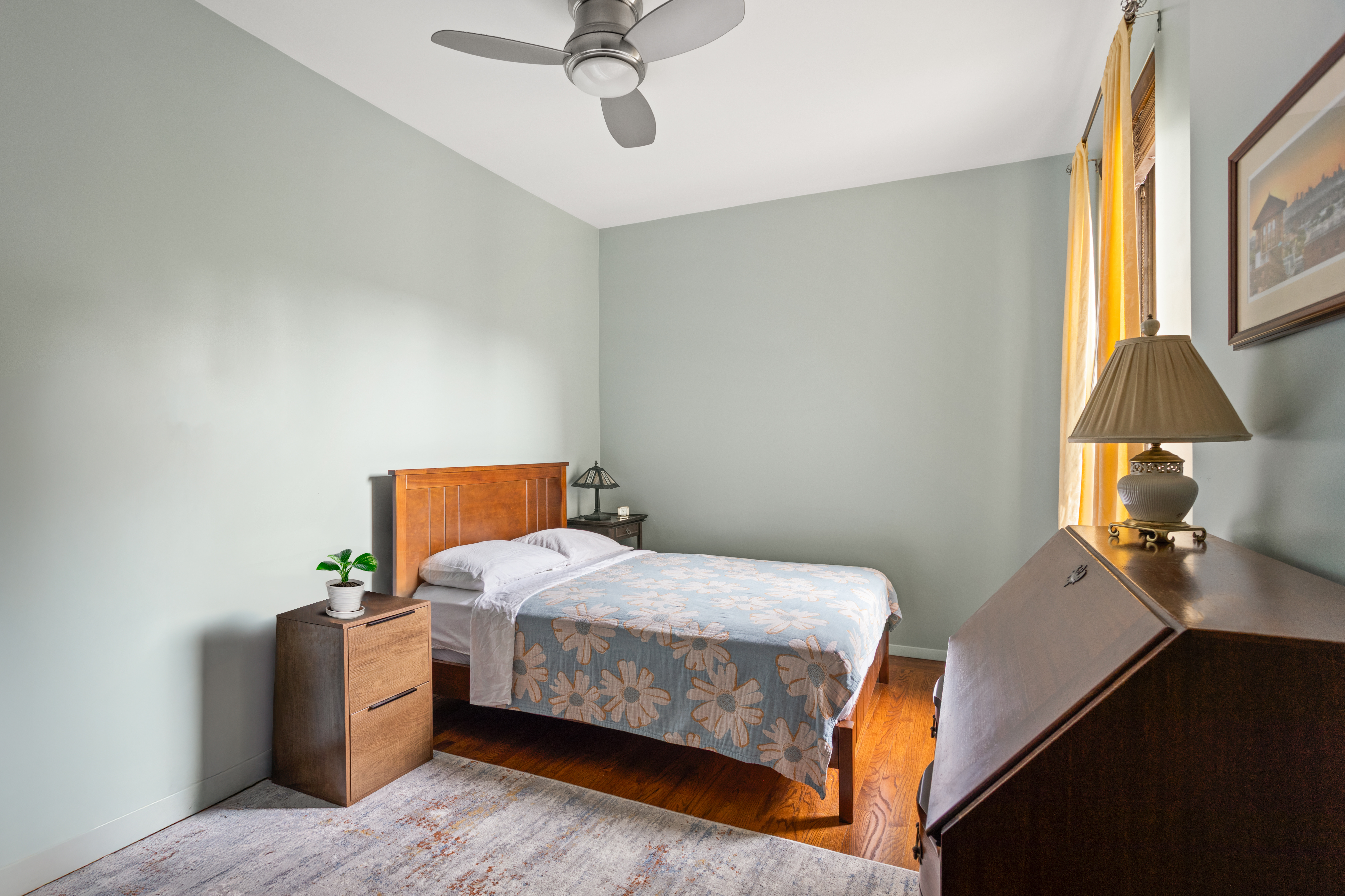 33-28 81st Street, Unit 61B Queens, NY 11372 - Photo 8 of 11 a bedroom with a bed and window