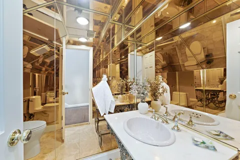 a view of a house with backyard and a garden