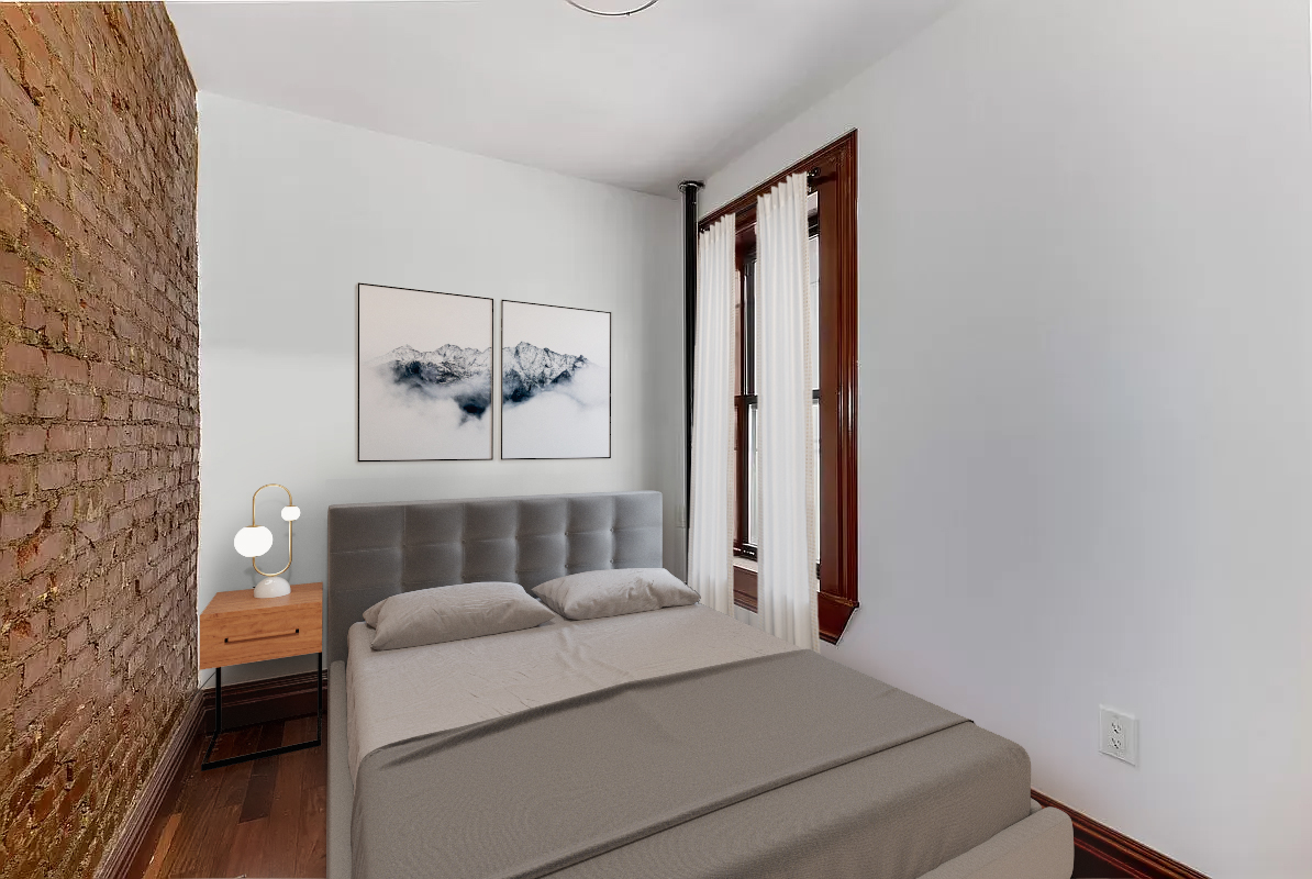 1392 Madison Avenue, Unit 4 Manhattan, NY 10128 - Photo 2 of 4 a living room with furniture and a window