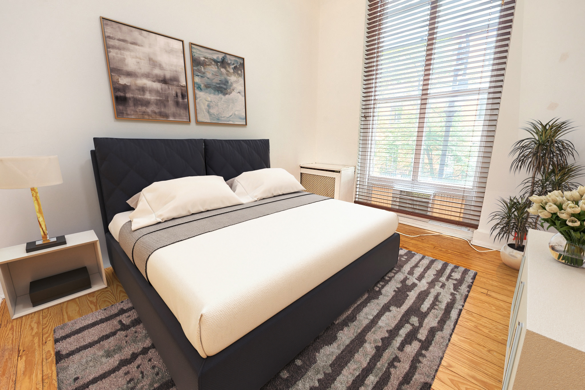 120 East 10th Street Manhattan, NY 10003 - Photo 8 of 23 a bedroom with a bed and wooden floor