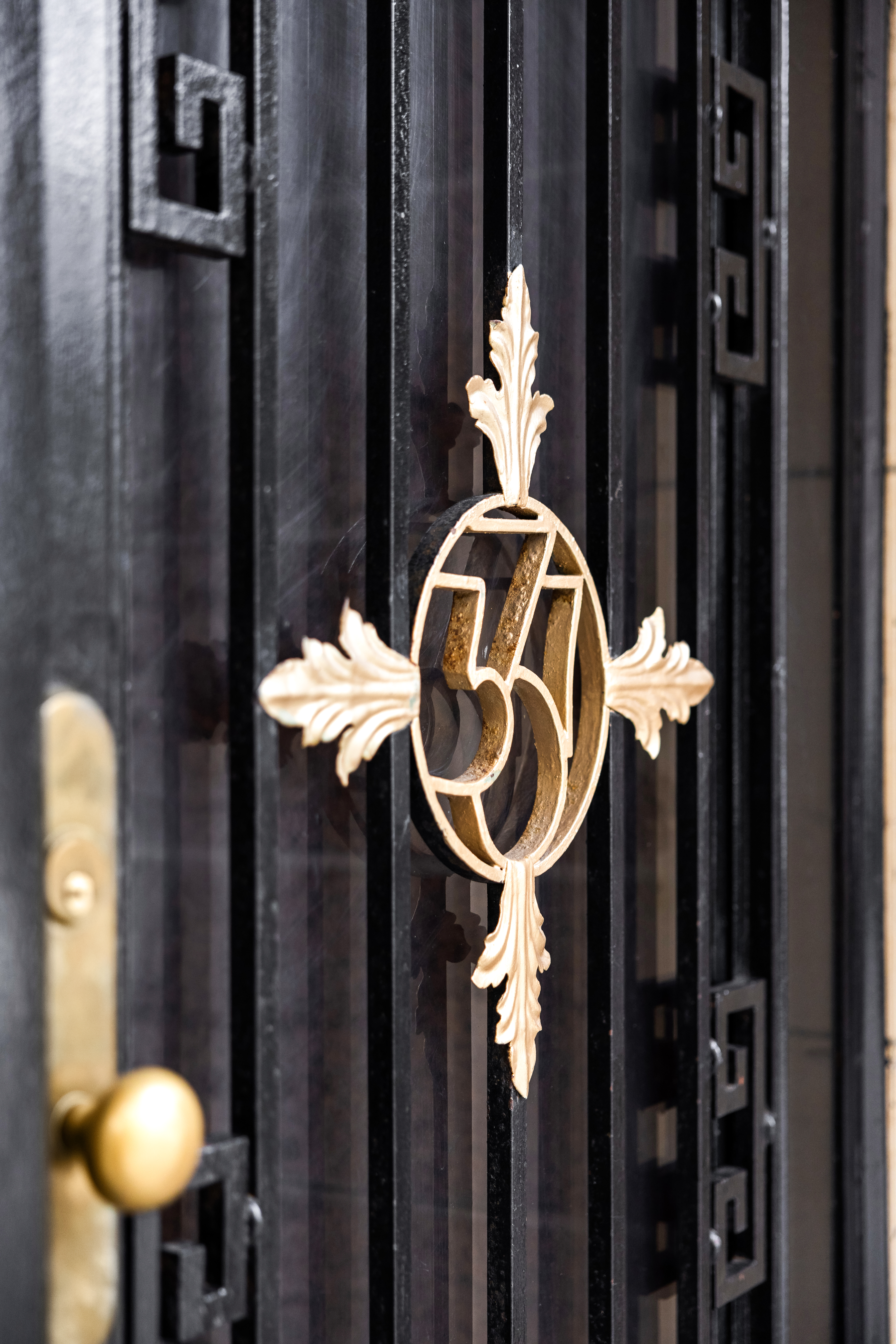 337 Riverside Drive Manhattan, NY 10025 - Photo 29 of 32 a close view of light fixtures and a wooden wall