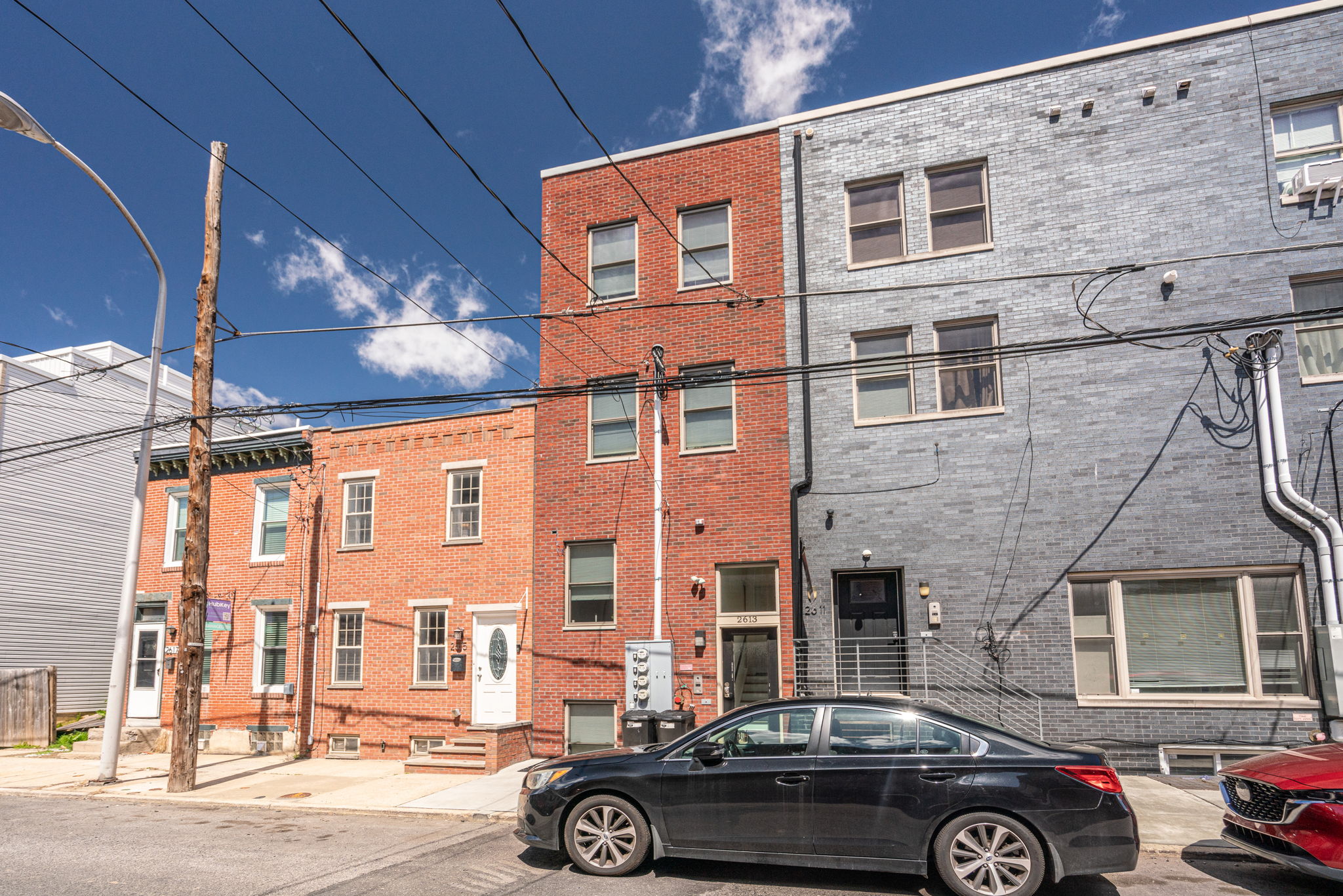 2613 Federal Street, Unit B Philadelphia, PA 19146 - Photo 19 of 21 a car parked in front of a building