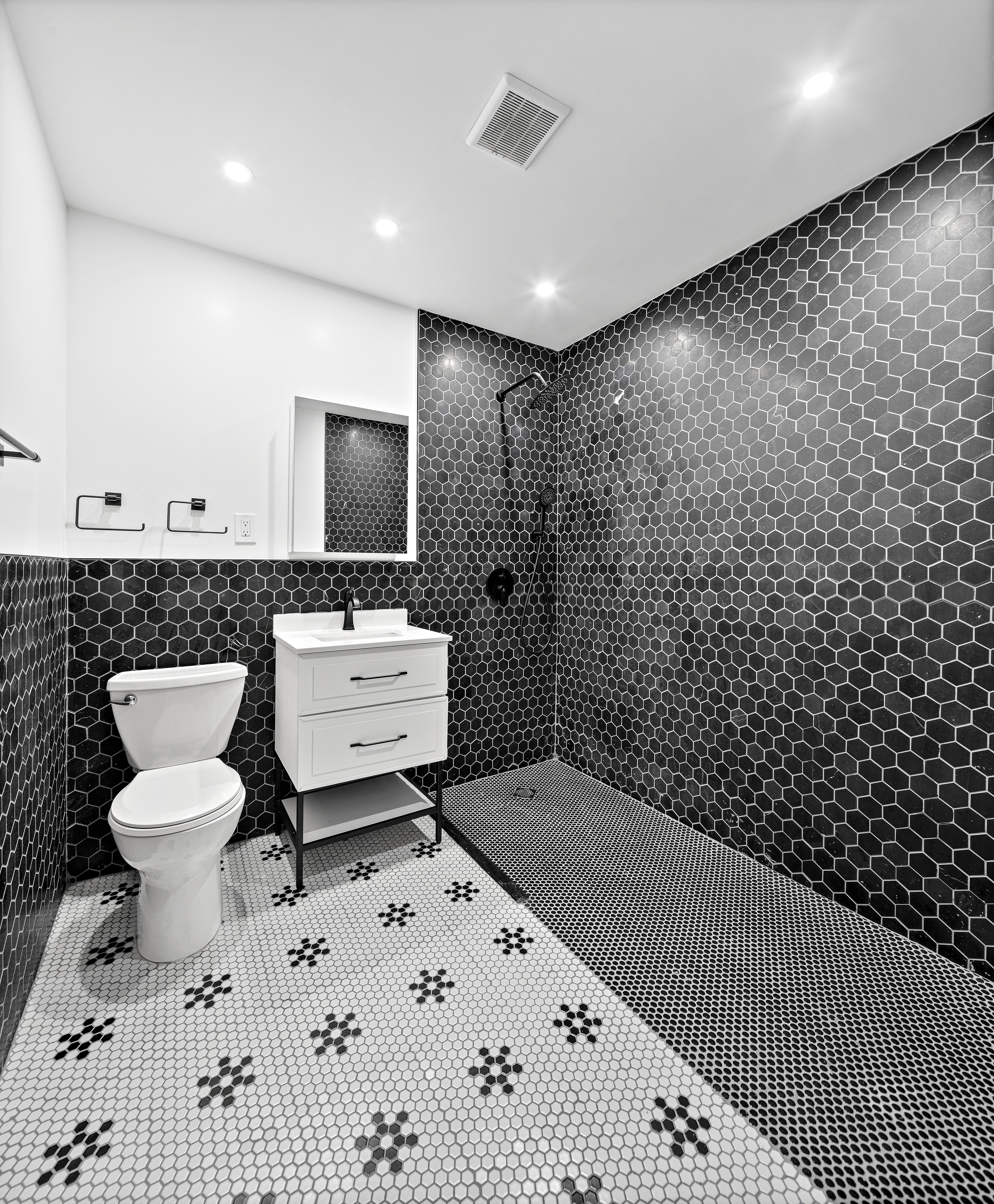 400 West 154th Street, Unit 1 Manhattan, NY 10032 - Photo 9 of 10 a bathroom with a sink toilet and shower