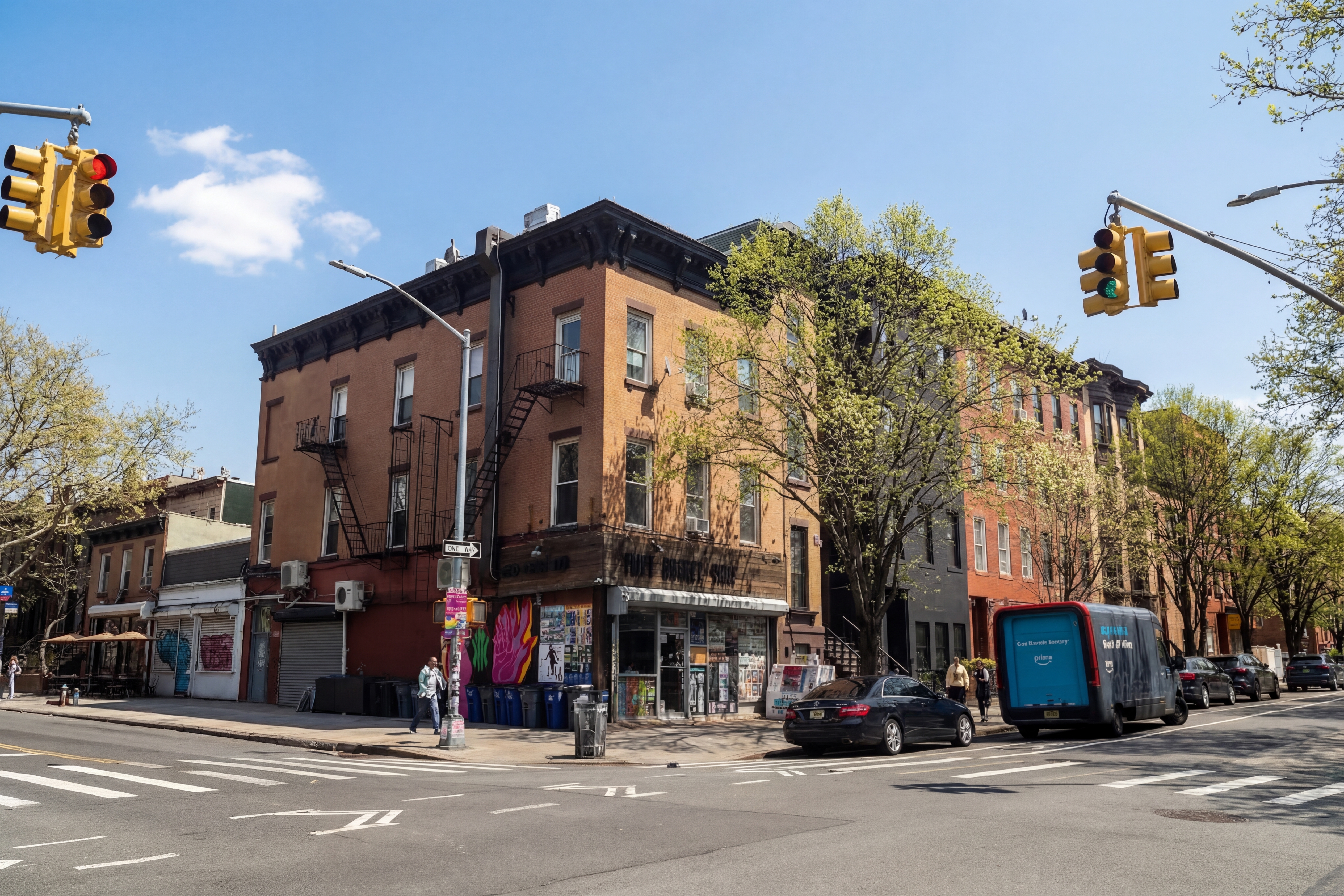258 Halsey Street, Unit 3 Brooklyn, NY 11216 - Photo 9 of 10 a view of a street with cars